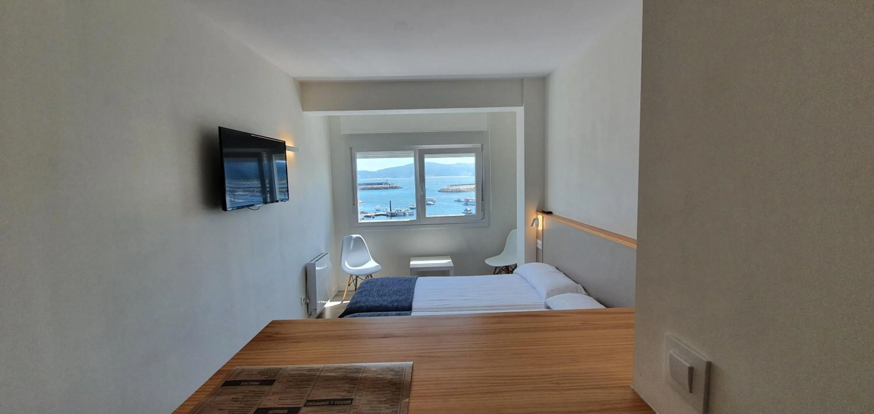 TV and multimedia, Bed in Apartamentos Costa da Morte Muxia