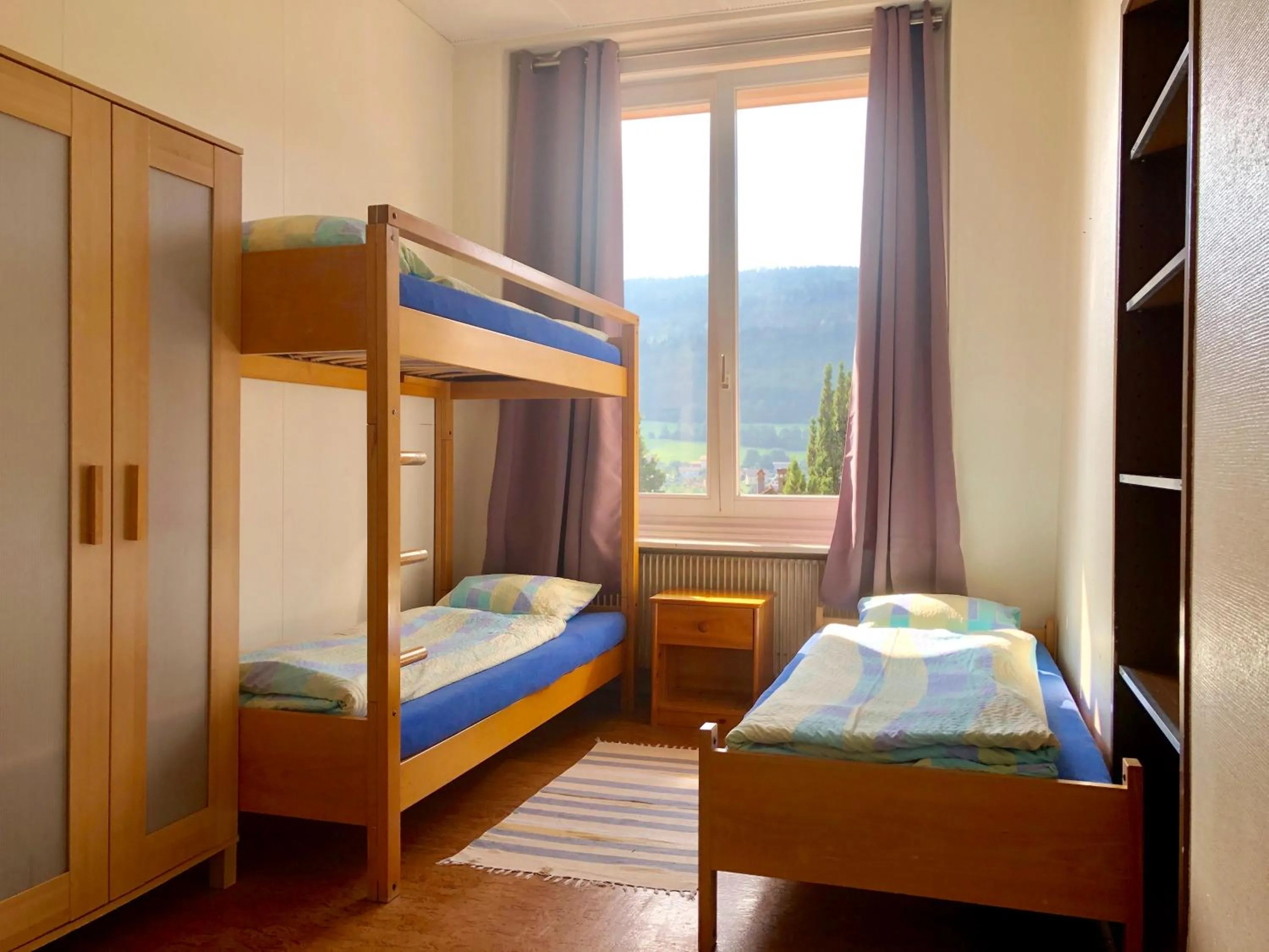 Bed in Auberge Pour Tous