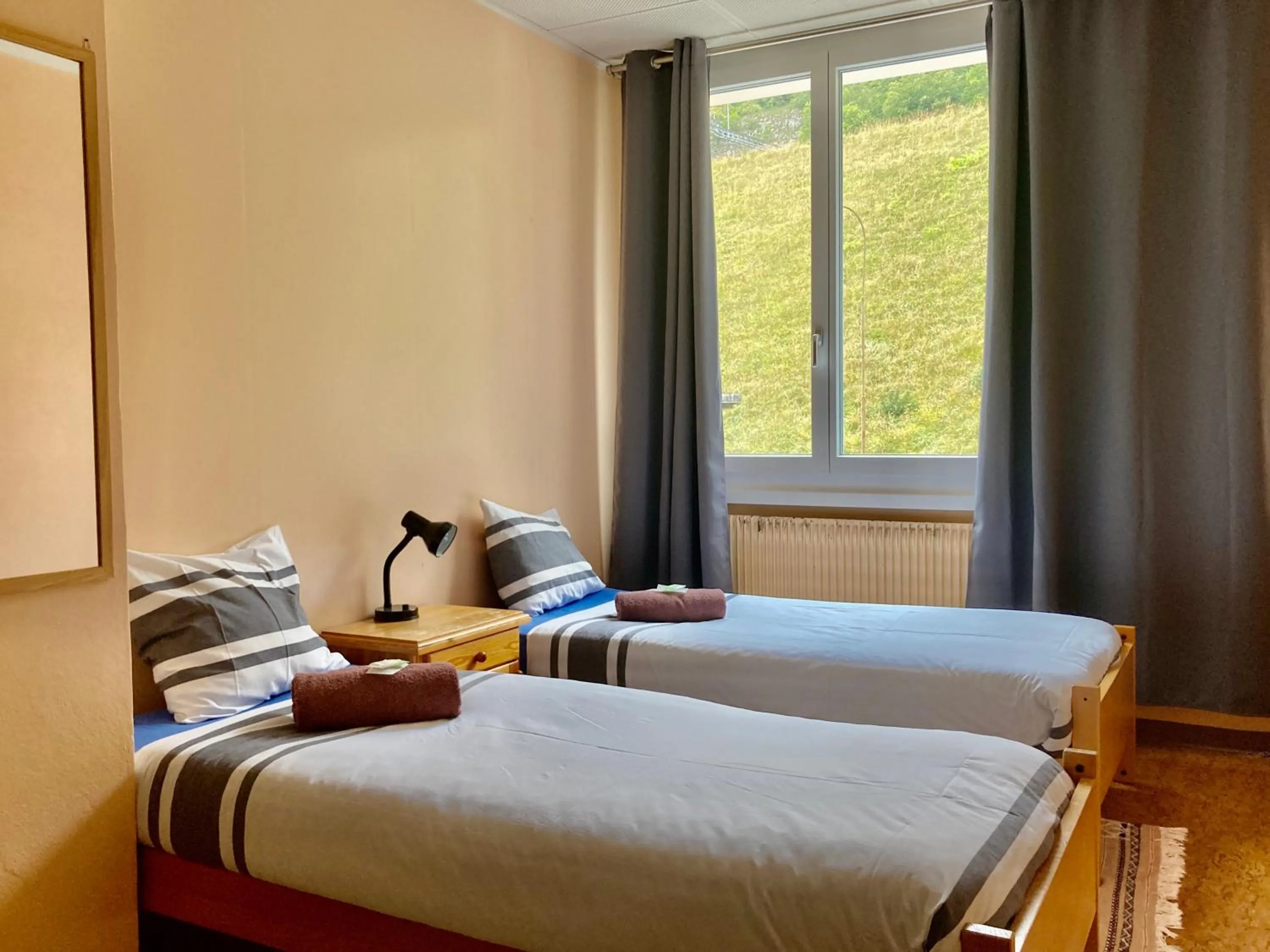 Bed in Auberge Pour Tous