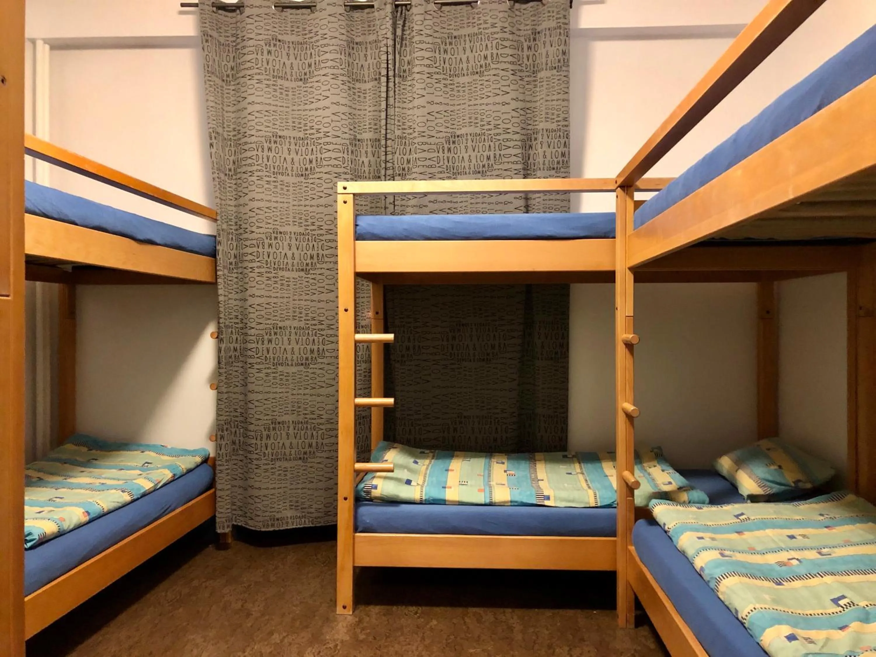 Bed in Auberge Pour Tous