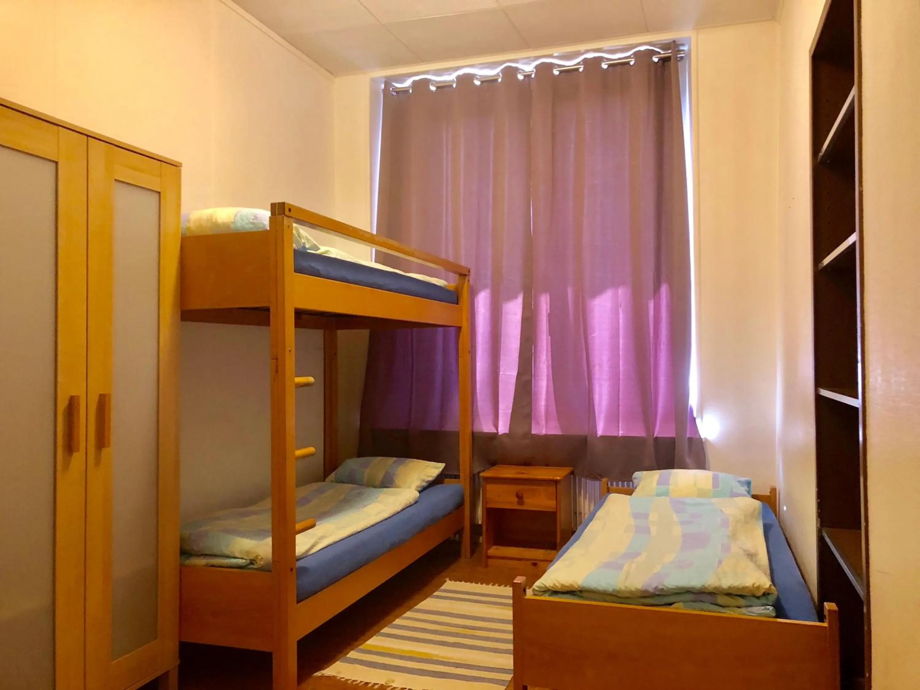 Bed in Auberge Pour Tous