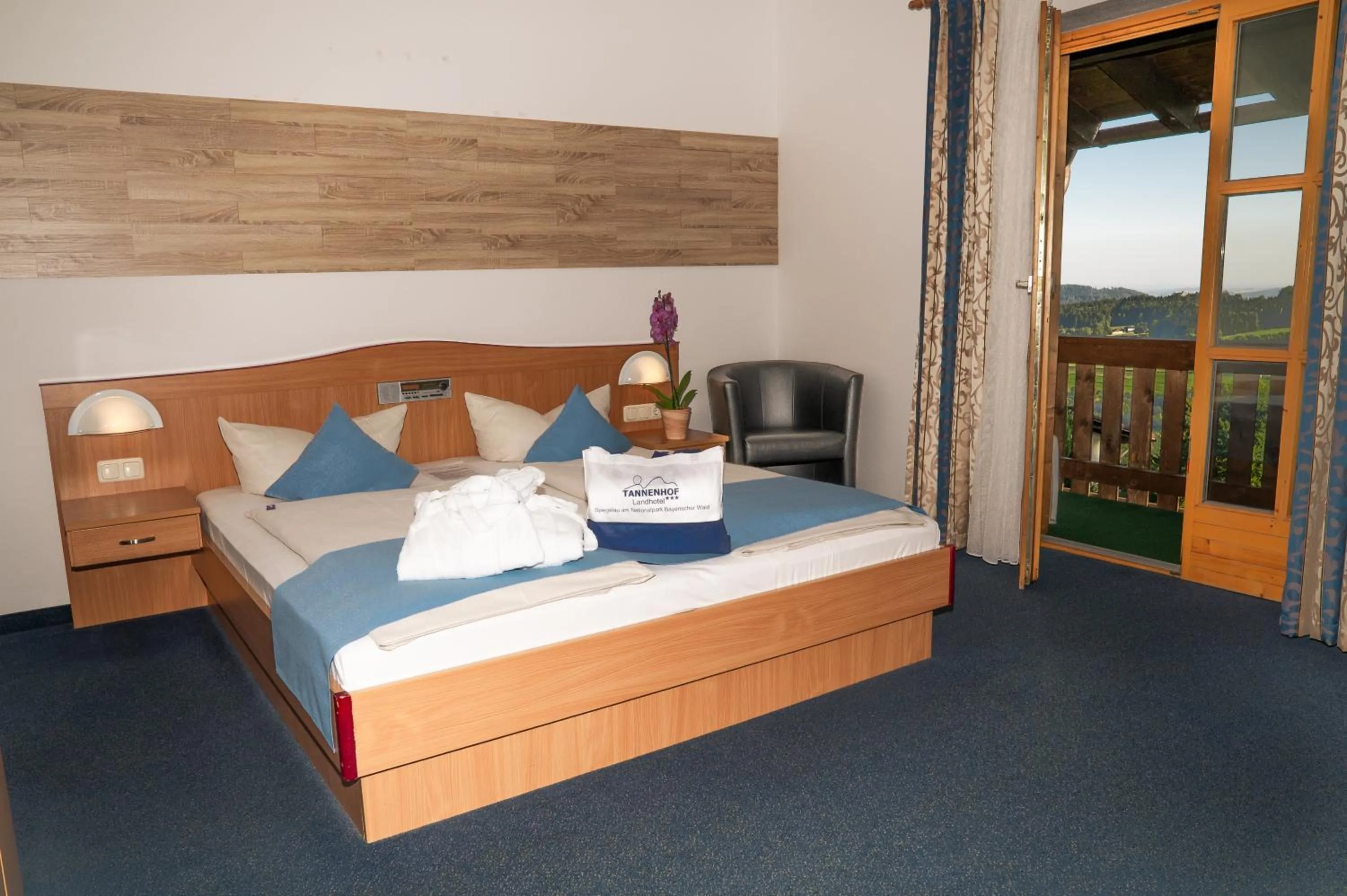 Photo of the whole room, Bed in Landhotel Tannenhof