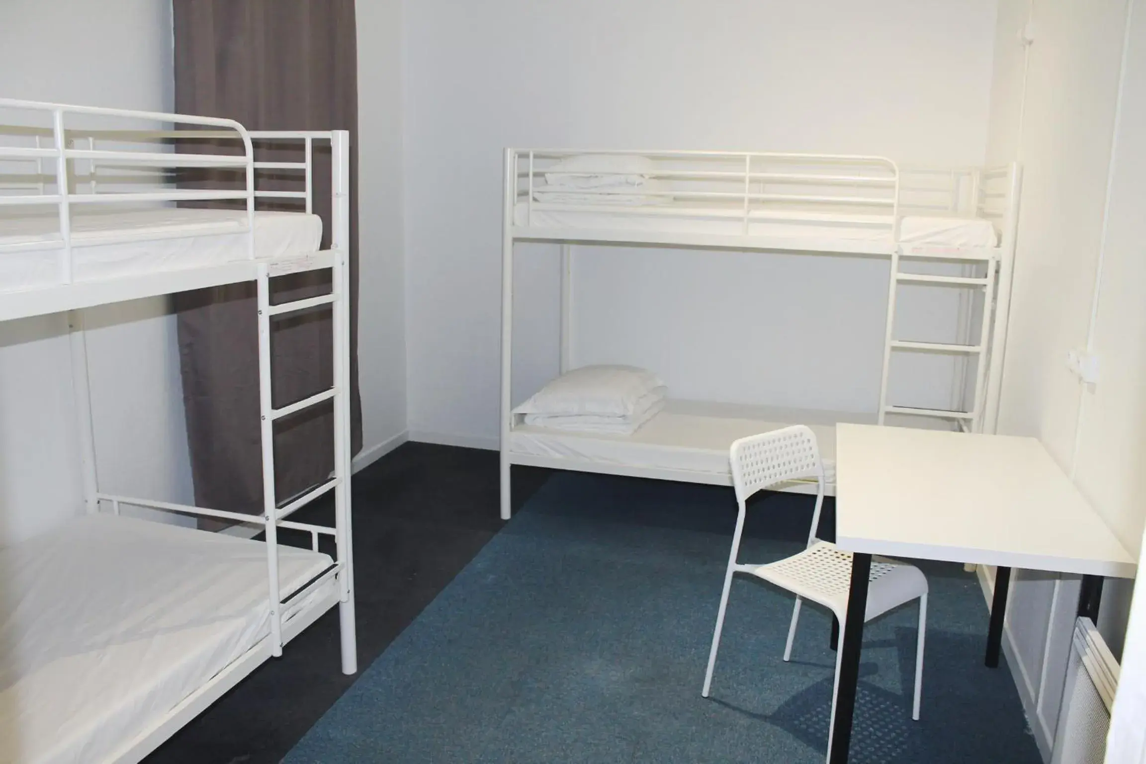 Quadruple Room with Shared Bathroom - single occupancy in Le Coffice Auberge de Jeunesse Quadruple Room with Shared Bathroom - single occupancy in Le Coffice Auberge de Jeunesse