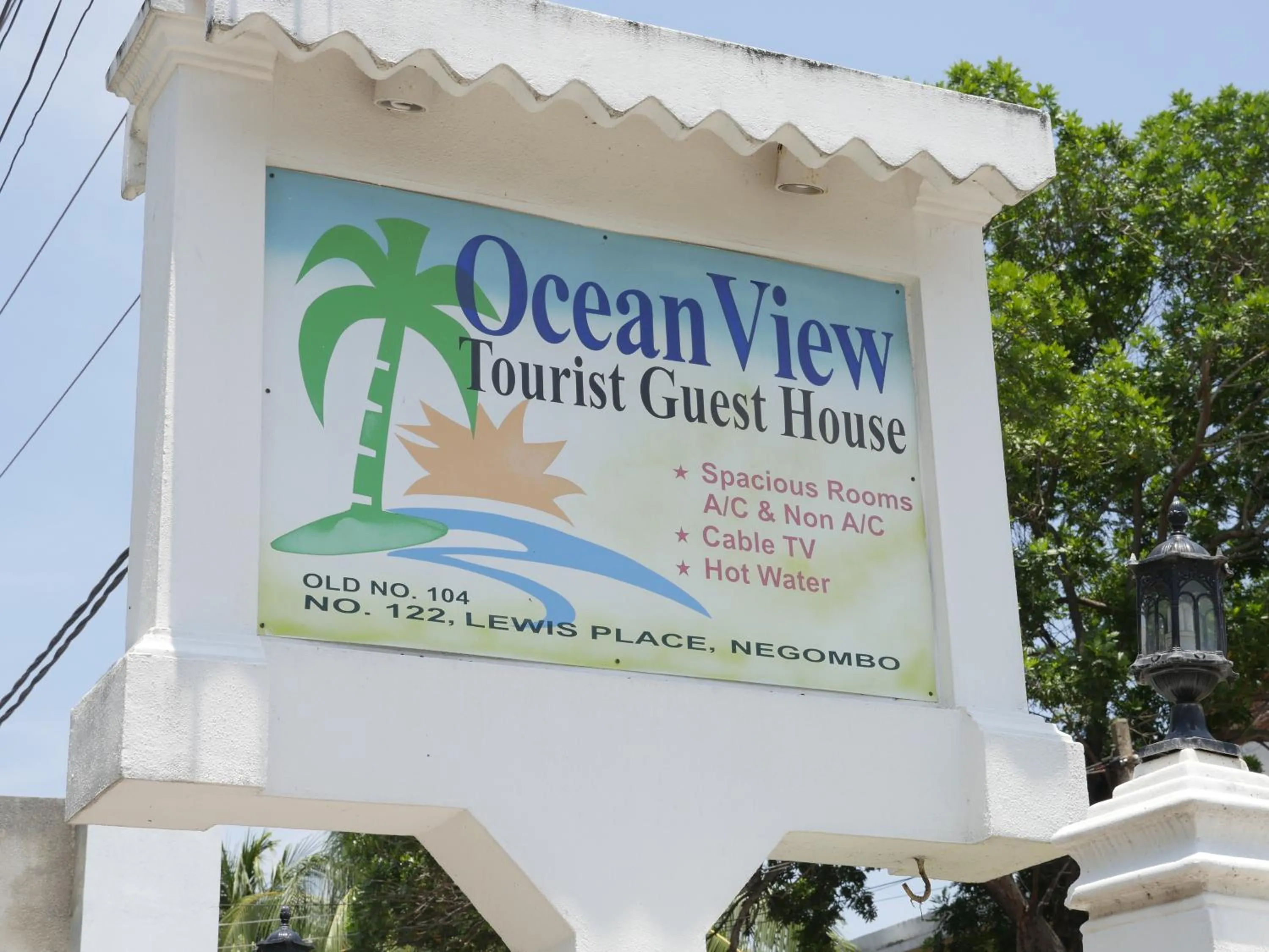 Property logo or sign in Ocean View tourist guest house at Negombo beach near the airport