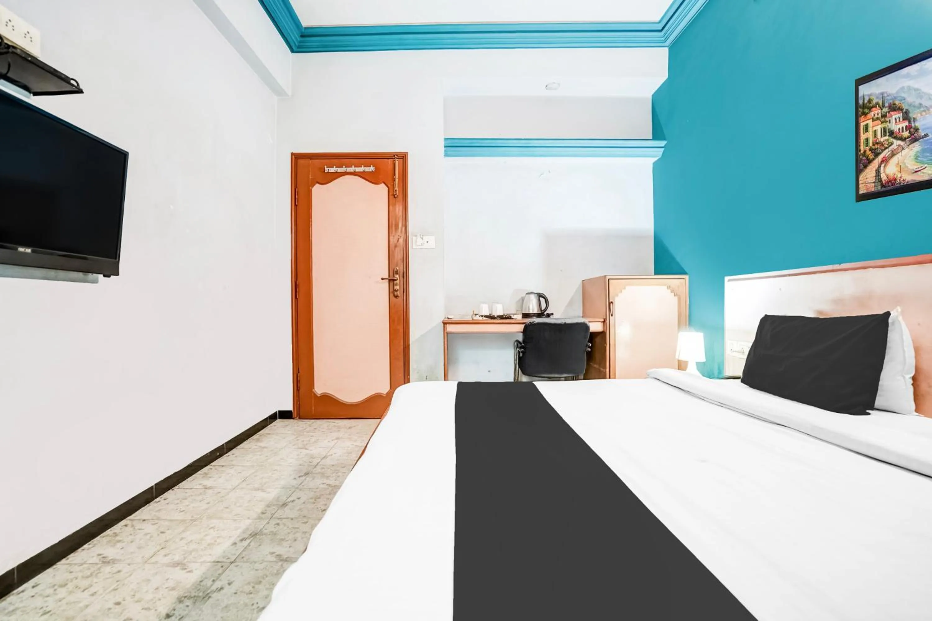 Bedroom, Bed in Super Hotel O Jamalpur Ahmedabad Formerly Hotel Peace