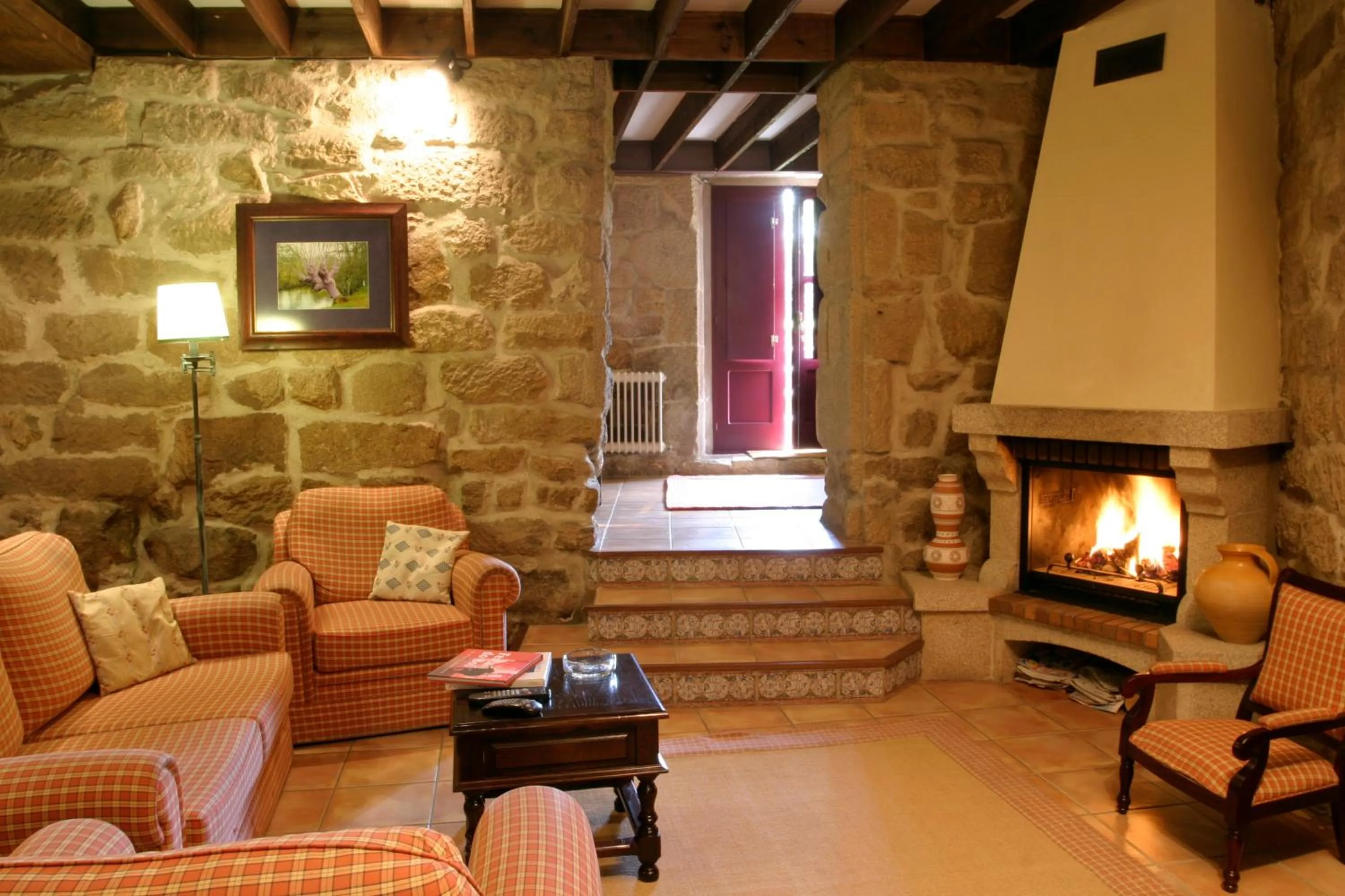 Communal lounge/ TV room in Hotel O Portelo Rural