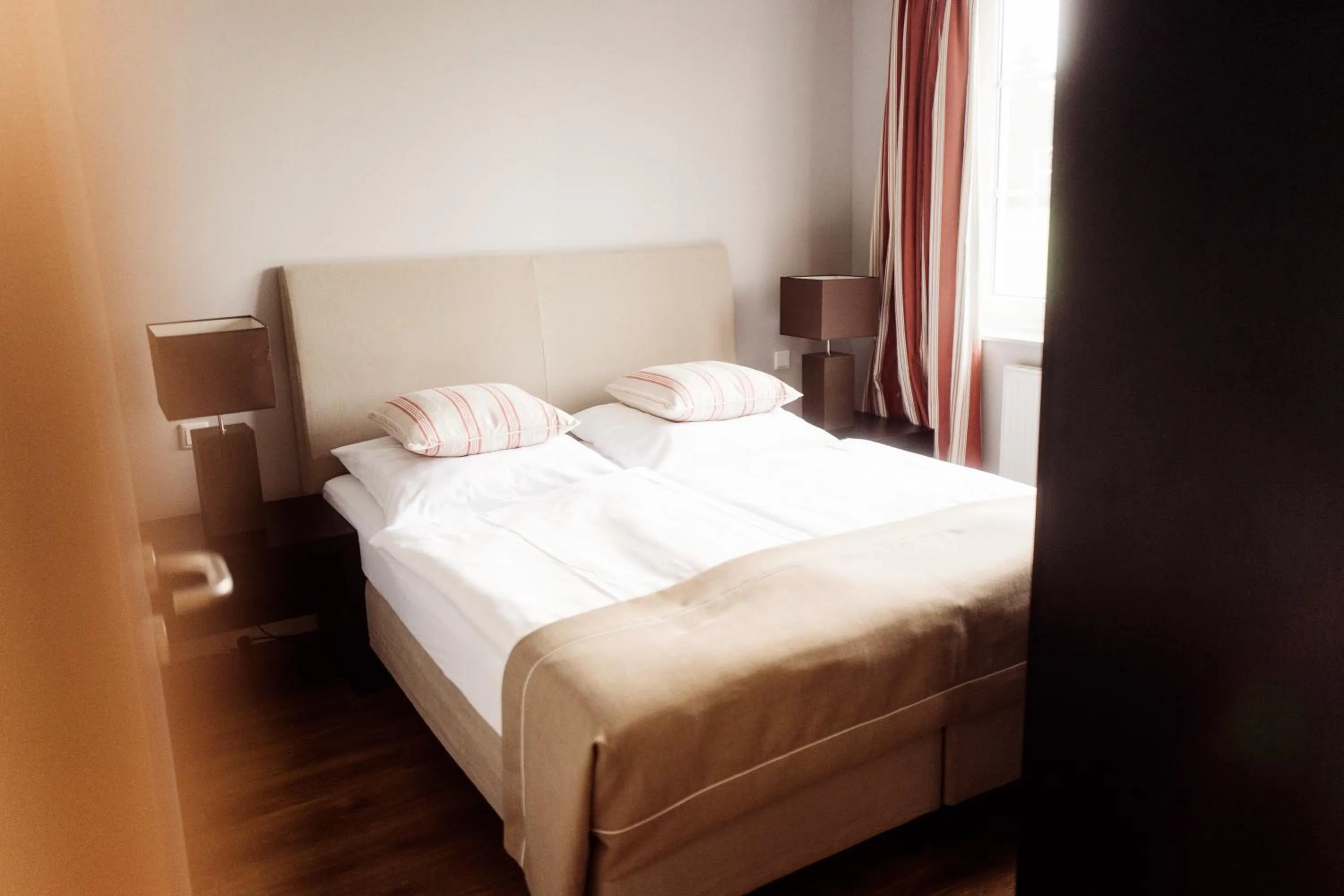 Bed in AUSZEIT Hotel