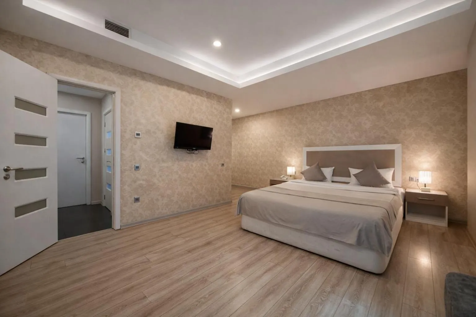 Bed in Diplomat Suites Hotel