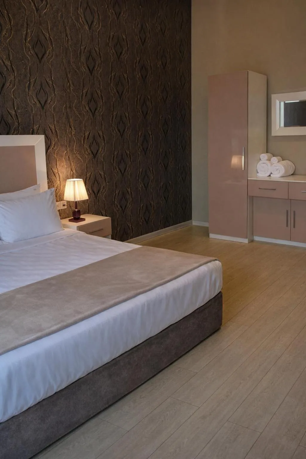 Bed in Diplomat Suites Hotel