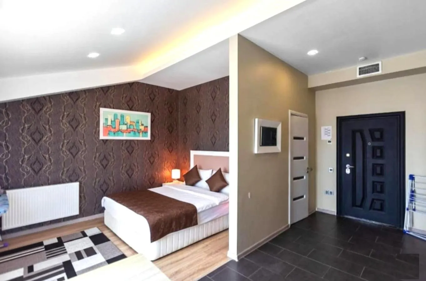 Bed in Diplomat Suites Hotel