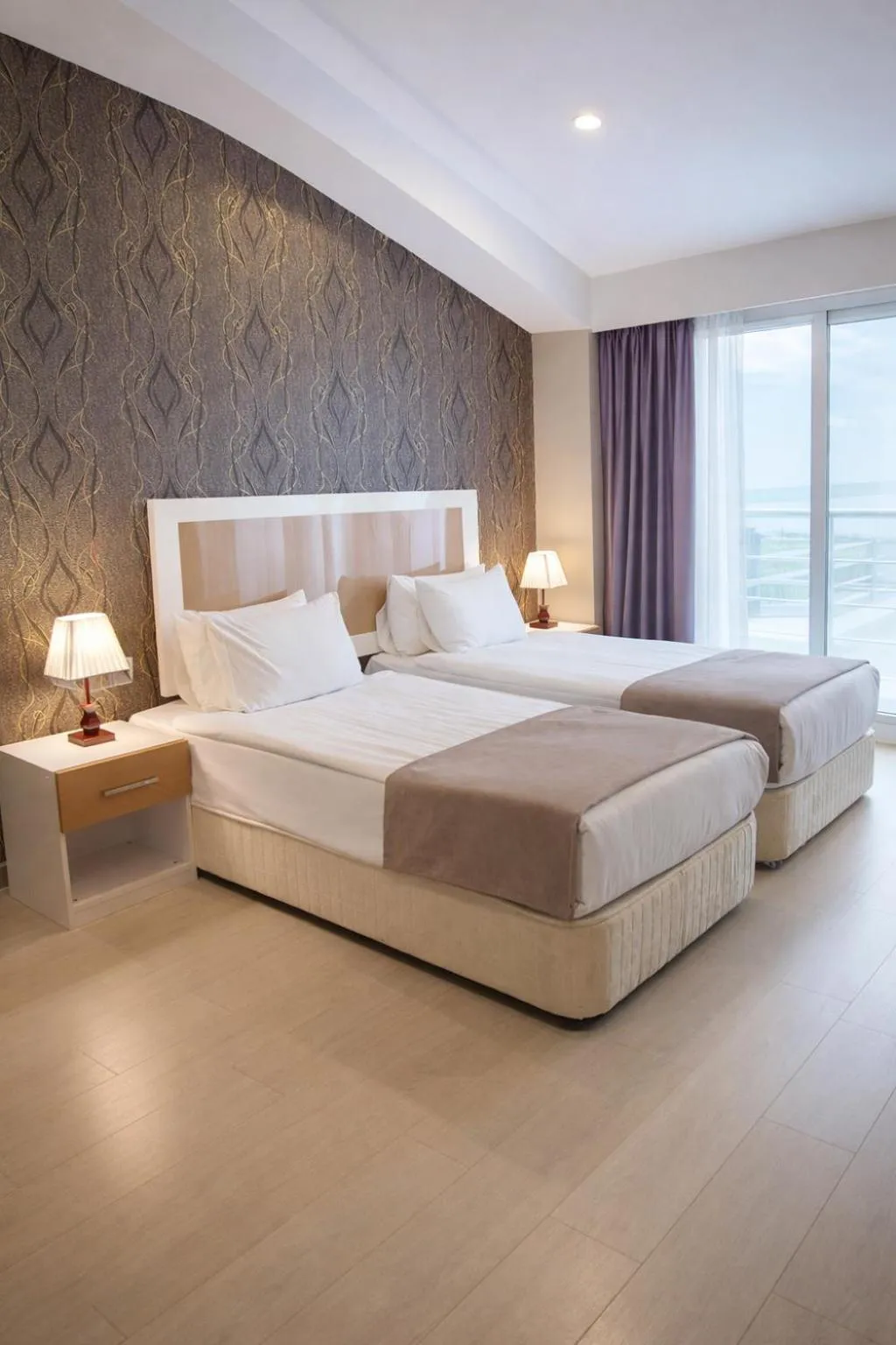 Bed in Diplomat Suites Hotel