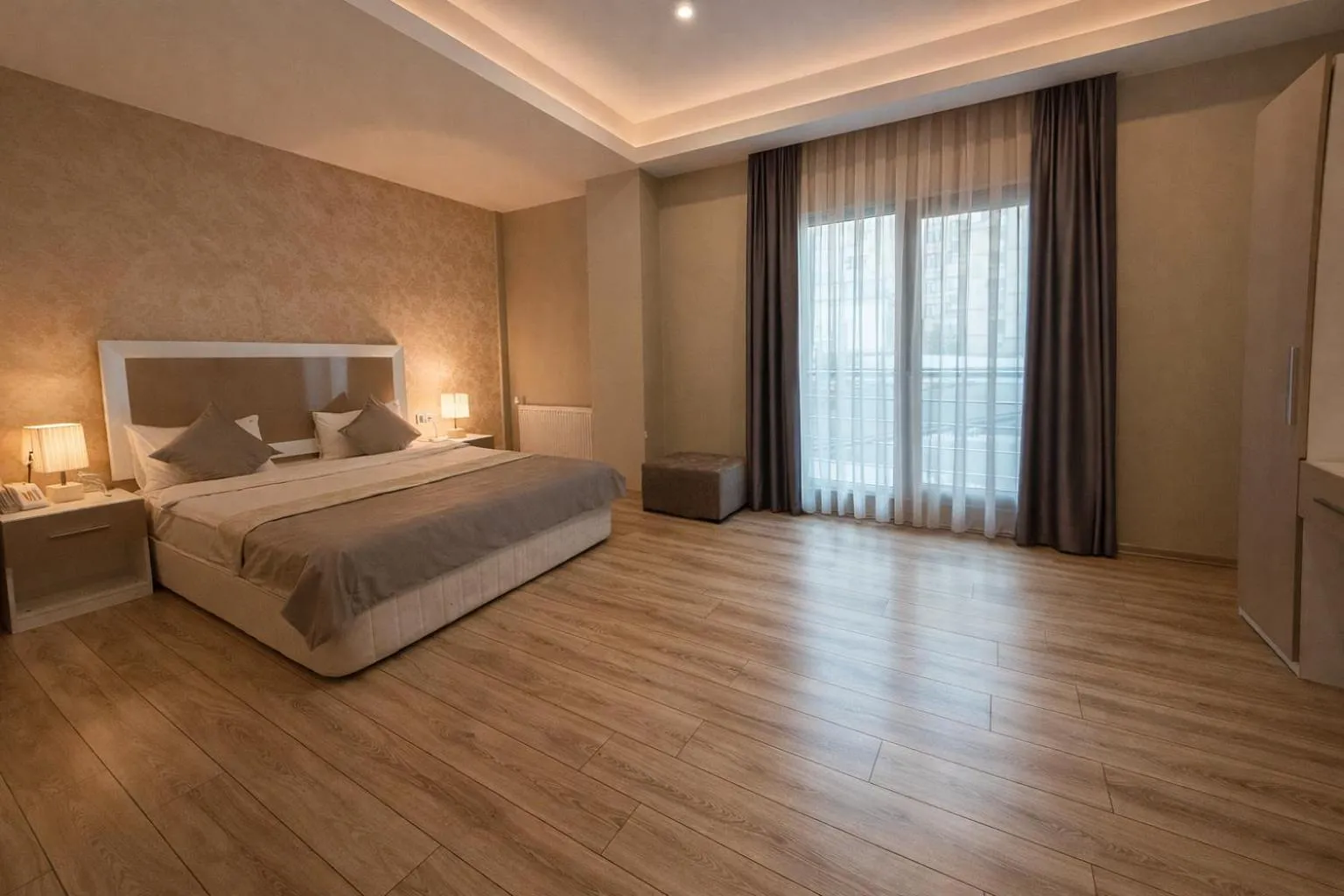 Bed in Diplomat Suites Hotel