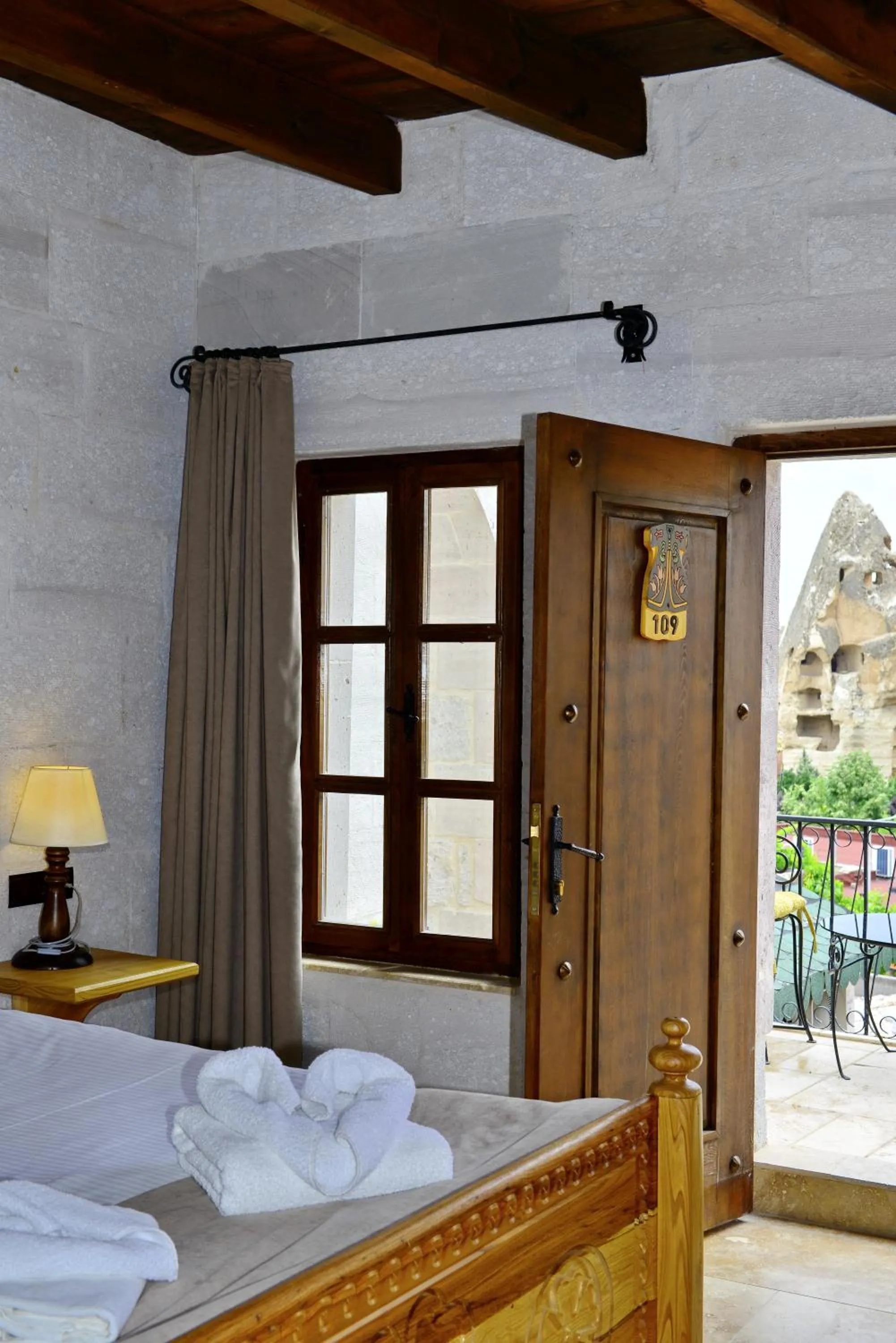 Bedroom, Bed in Caftan Cave Suites