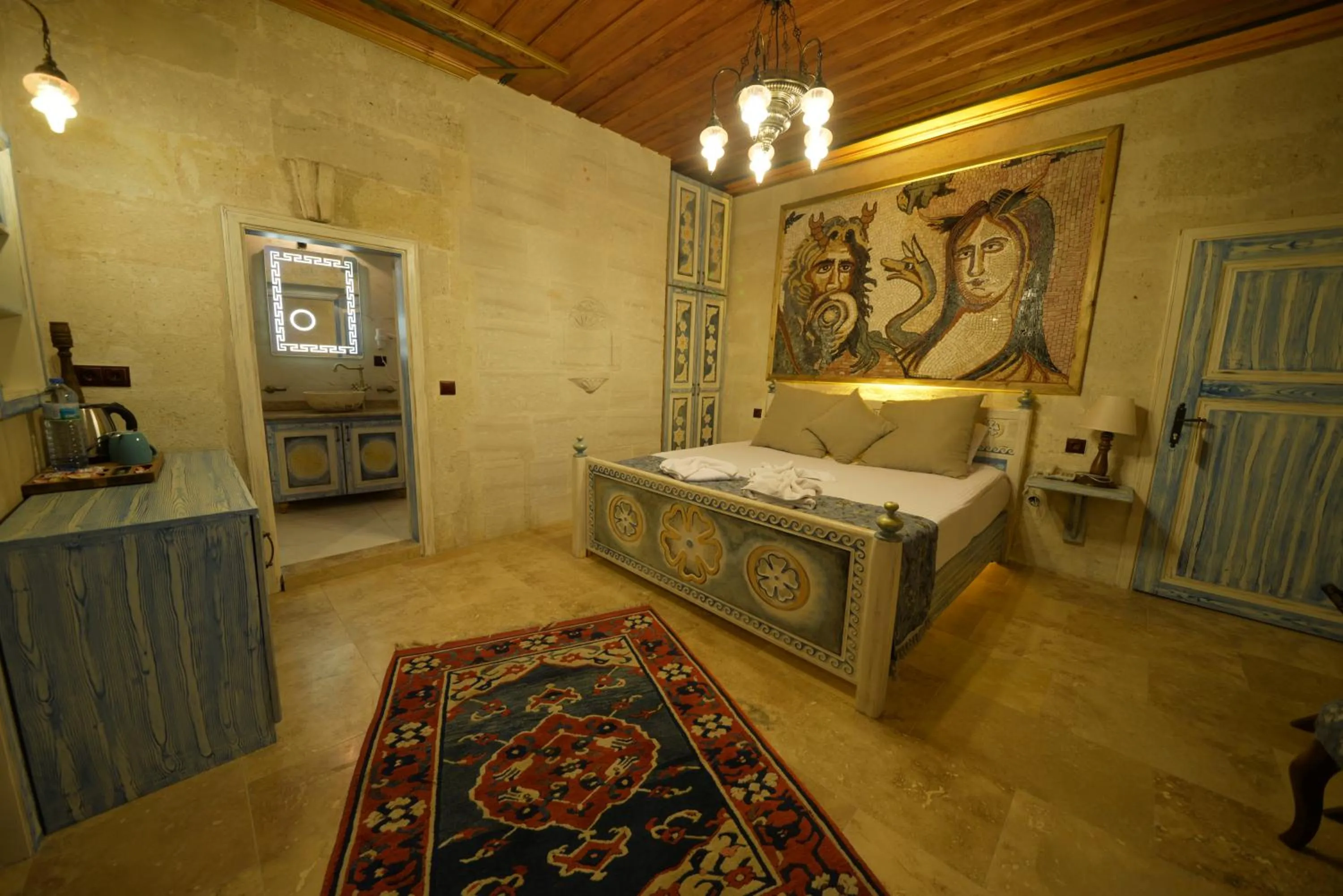 Bedroom, Bed in Caftan Cave Suites