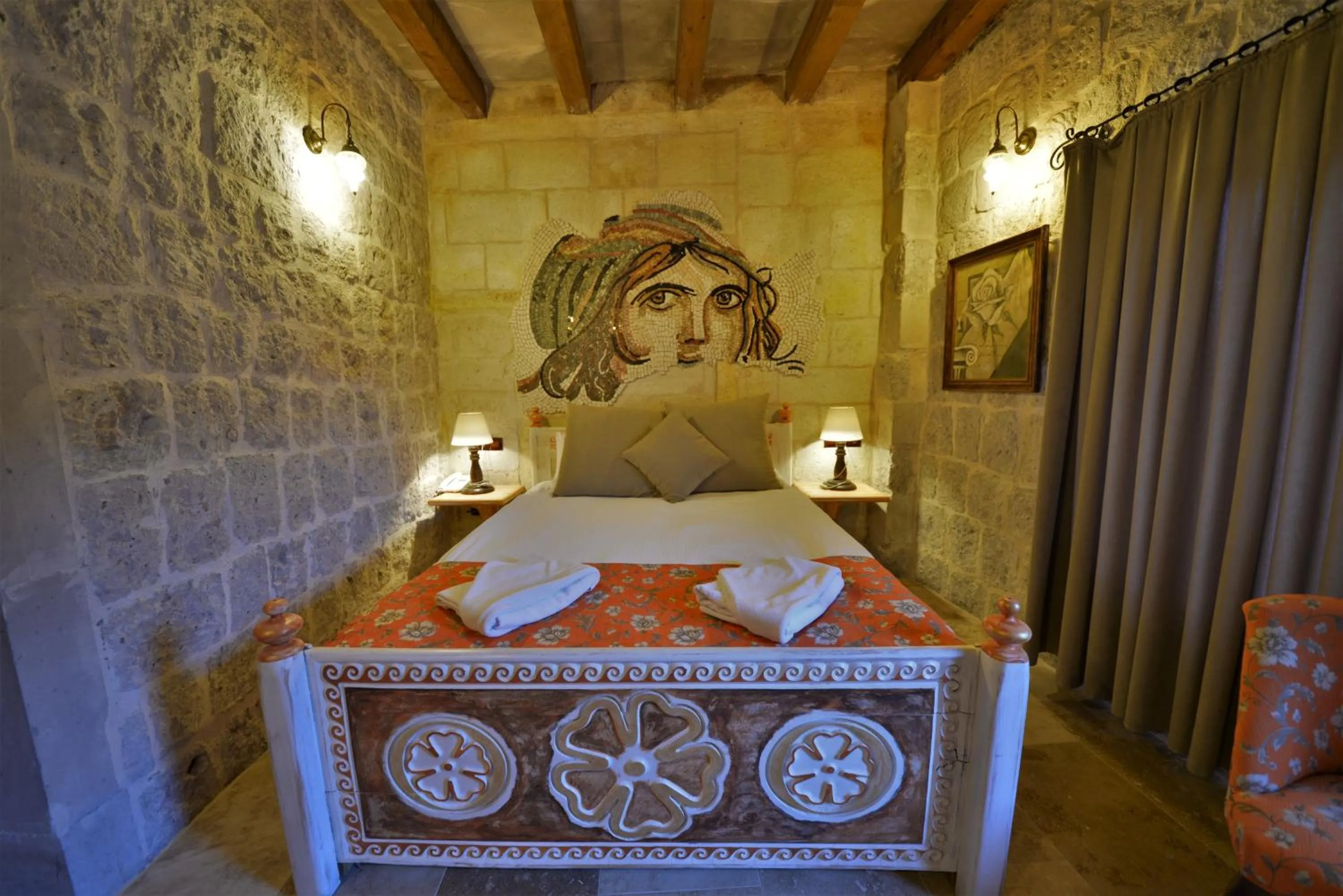 Bedroom, Bed in Caftan Cave Suites