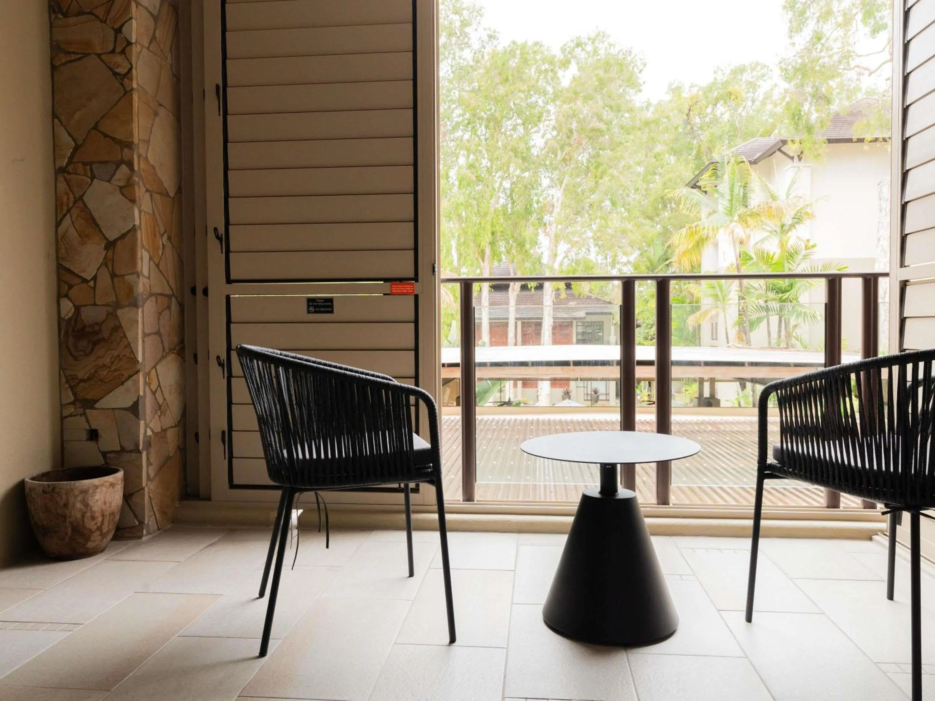 Bedroom in Pullman Palm Cove Sea Temple Resort & Spa