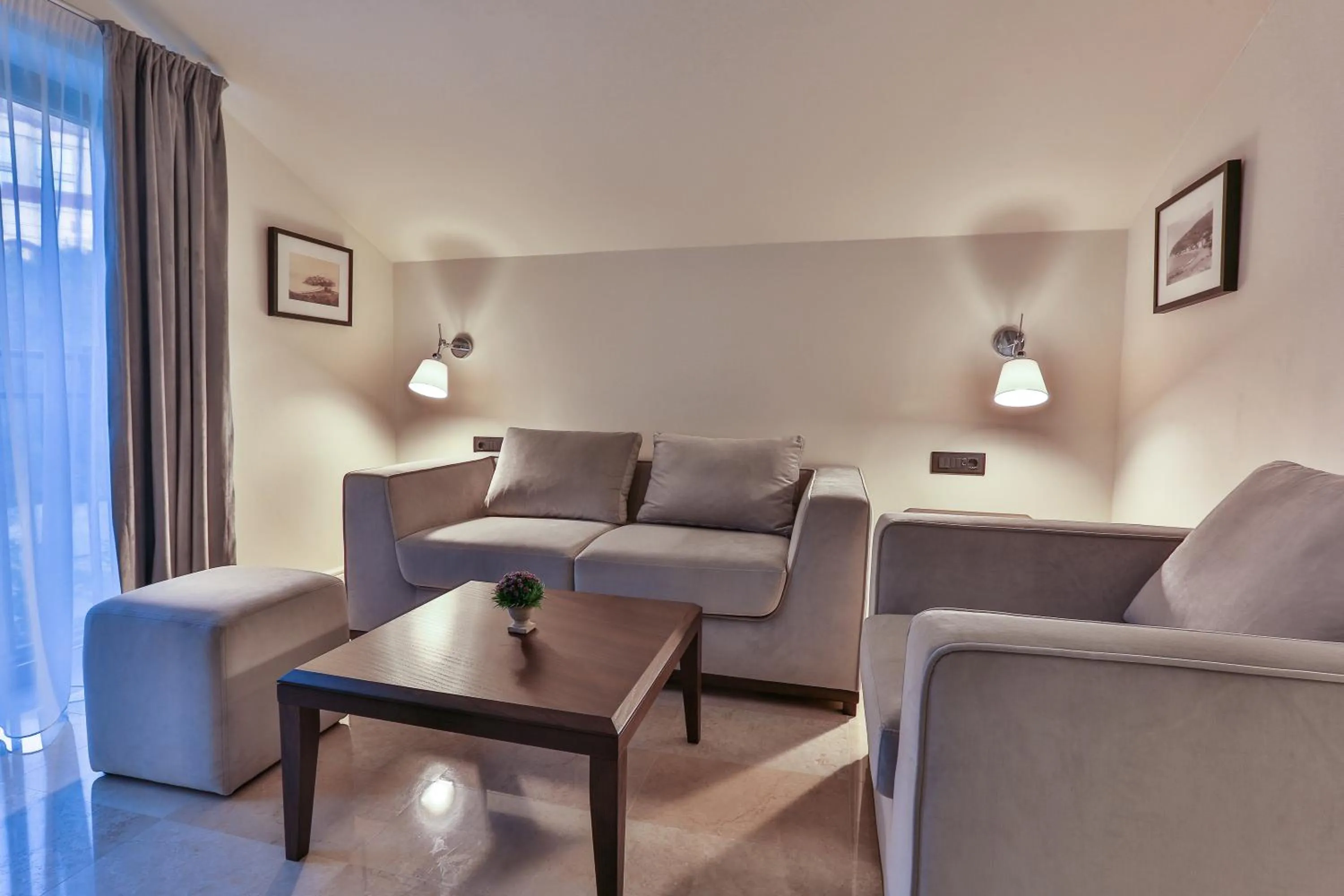 Seating area in Hotel California by Aycon