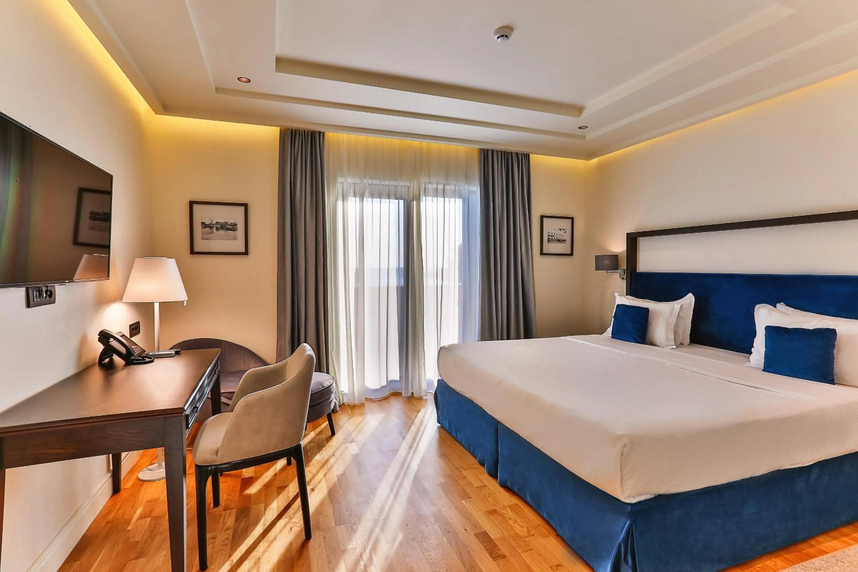 Photo of the whole room, Bed in Hotel California by Aycon