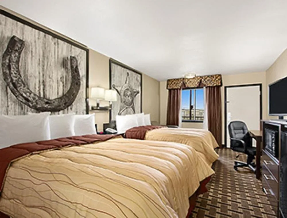 Photo of the whole room, Bed in Super 8 by Wyndham Fort Worth TX