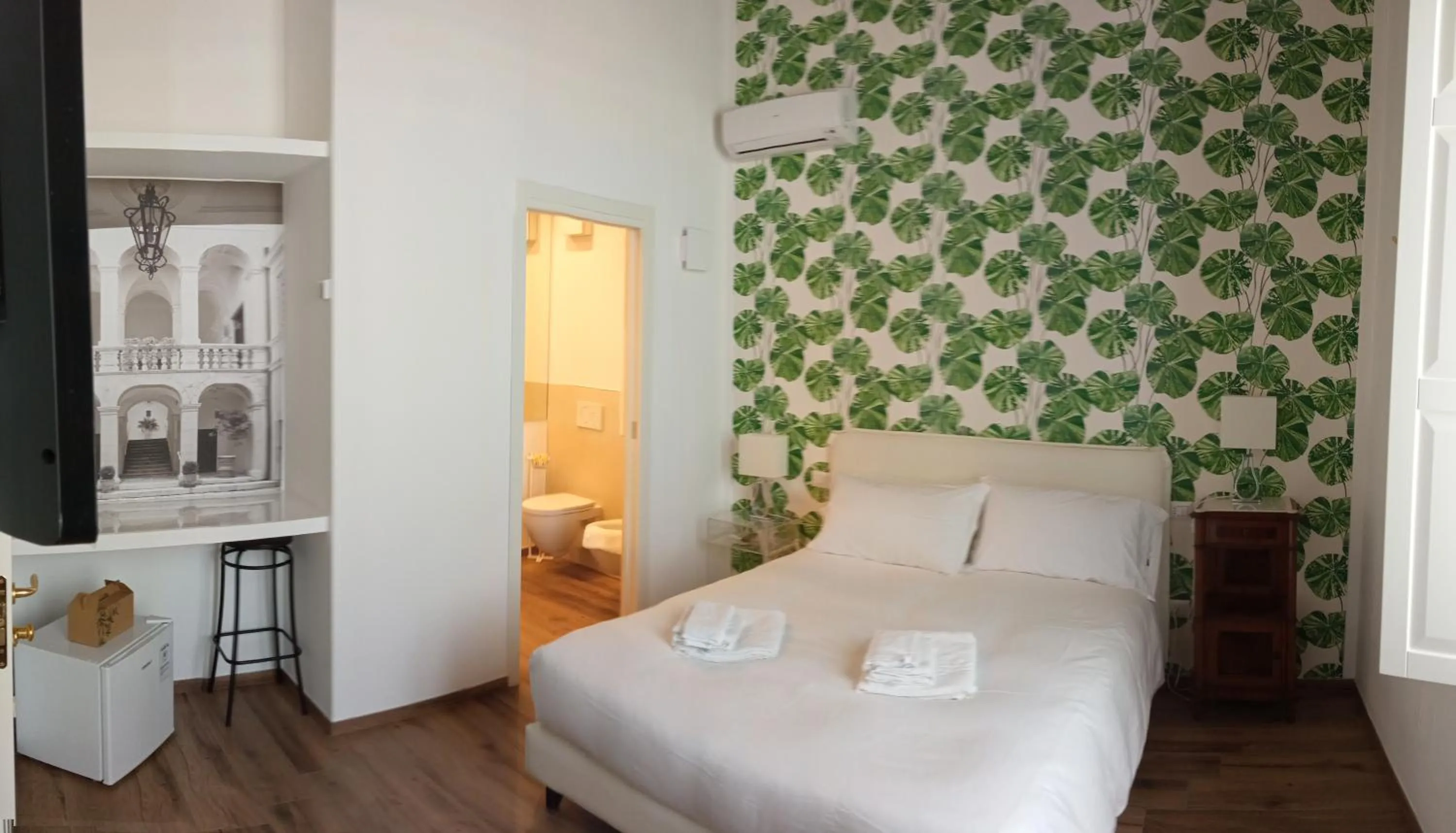 Photo of the whole room, Bed in La Soffitta Covelli