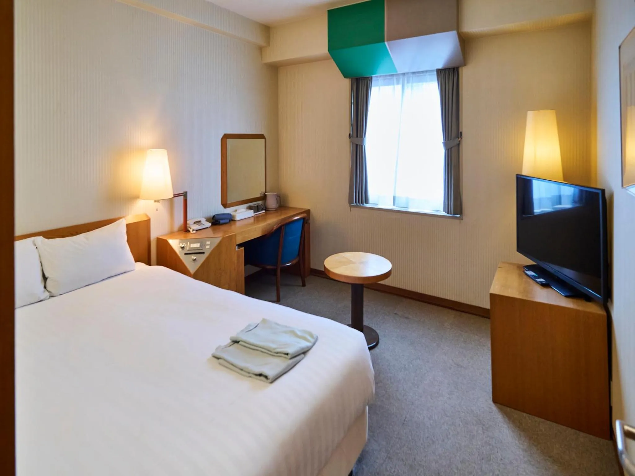 Bed in Court Hotel Fukuoka Tenjin