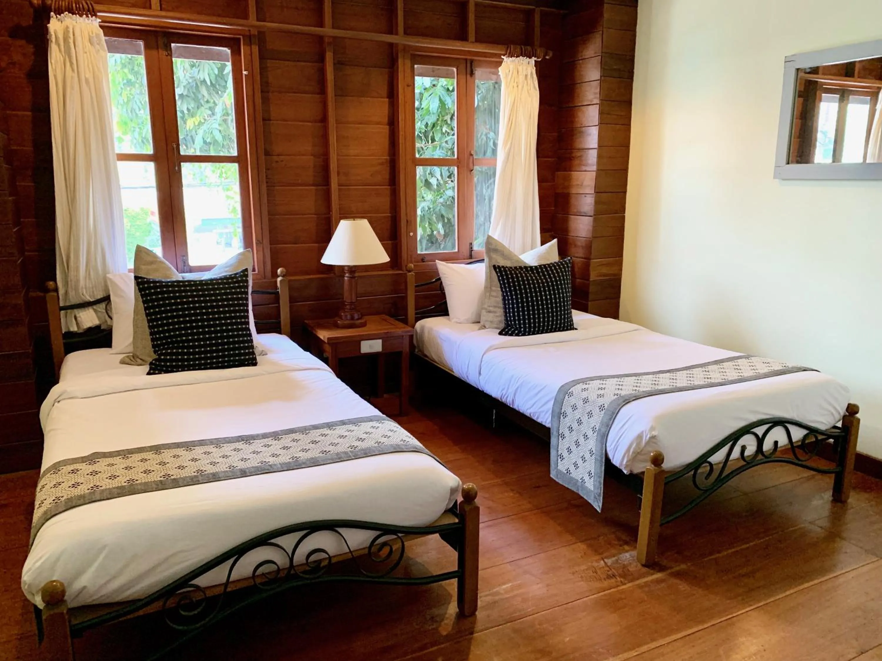 Bed in Riverhouse-The Teak House