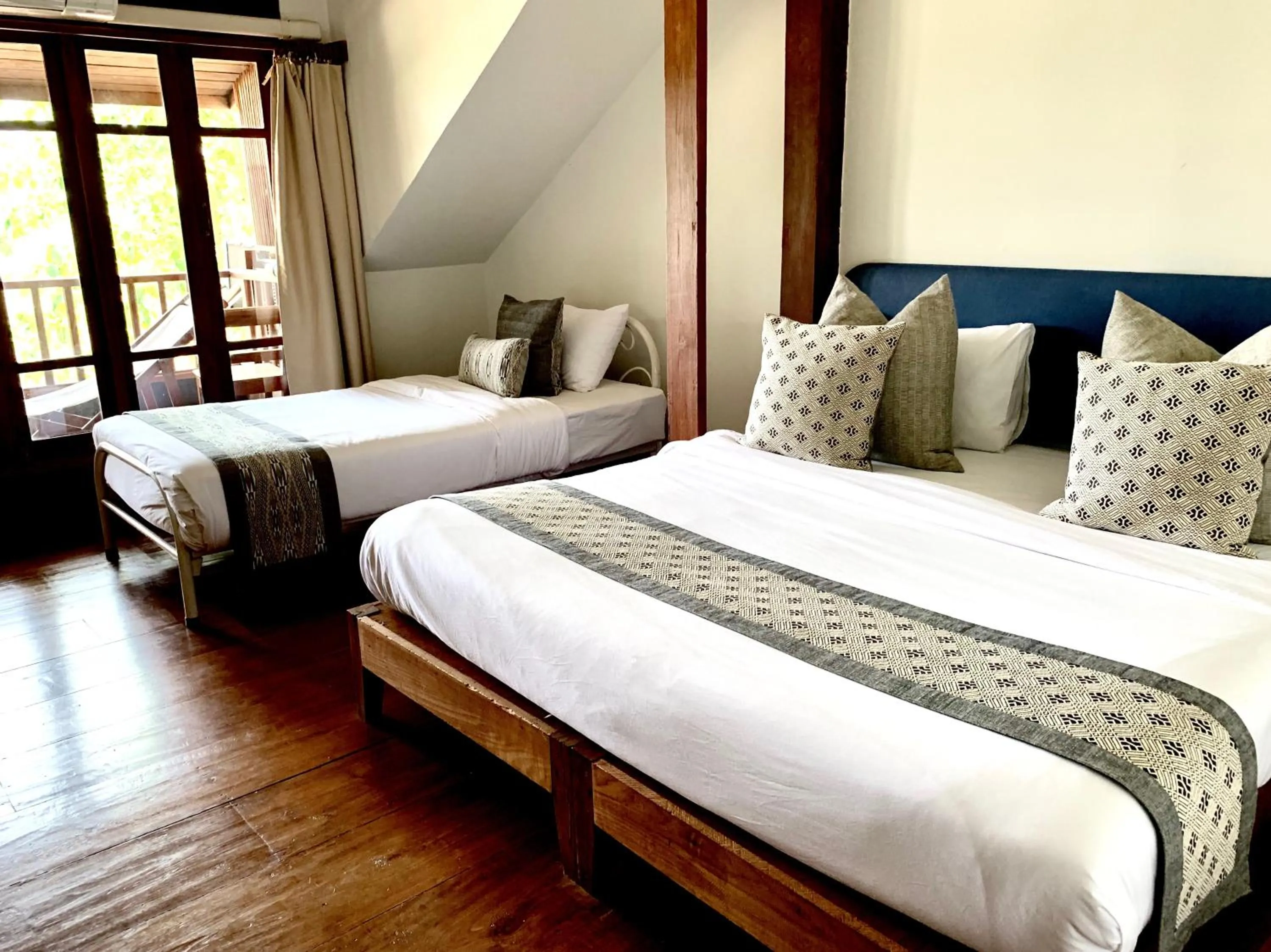 Photo of the whole room, Bed in Riverhouse-The Teak House