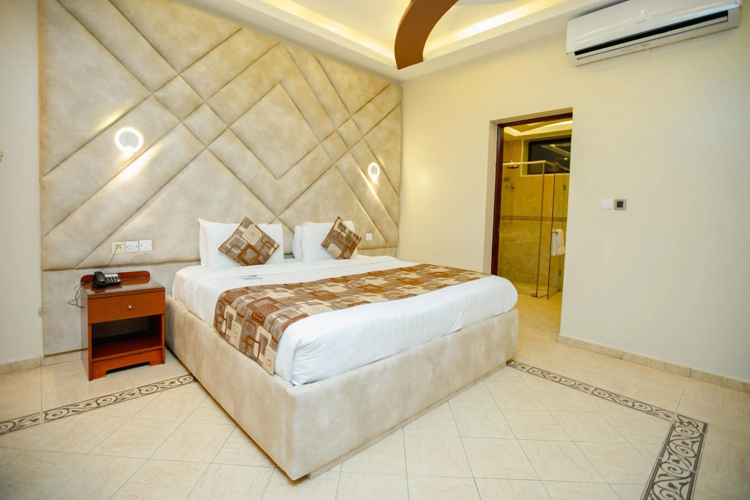 Bed in Malaika Beach Resort