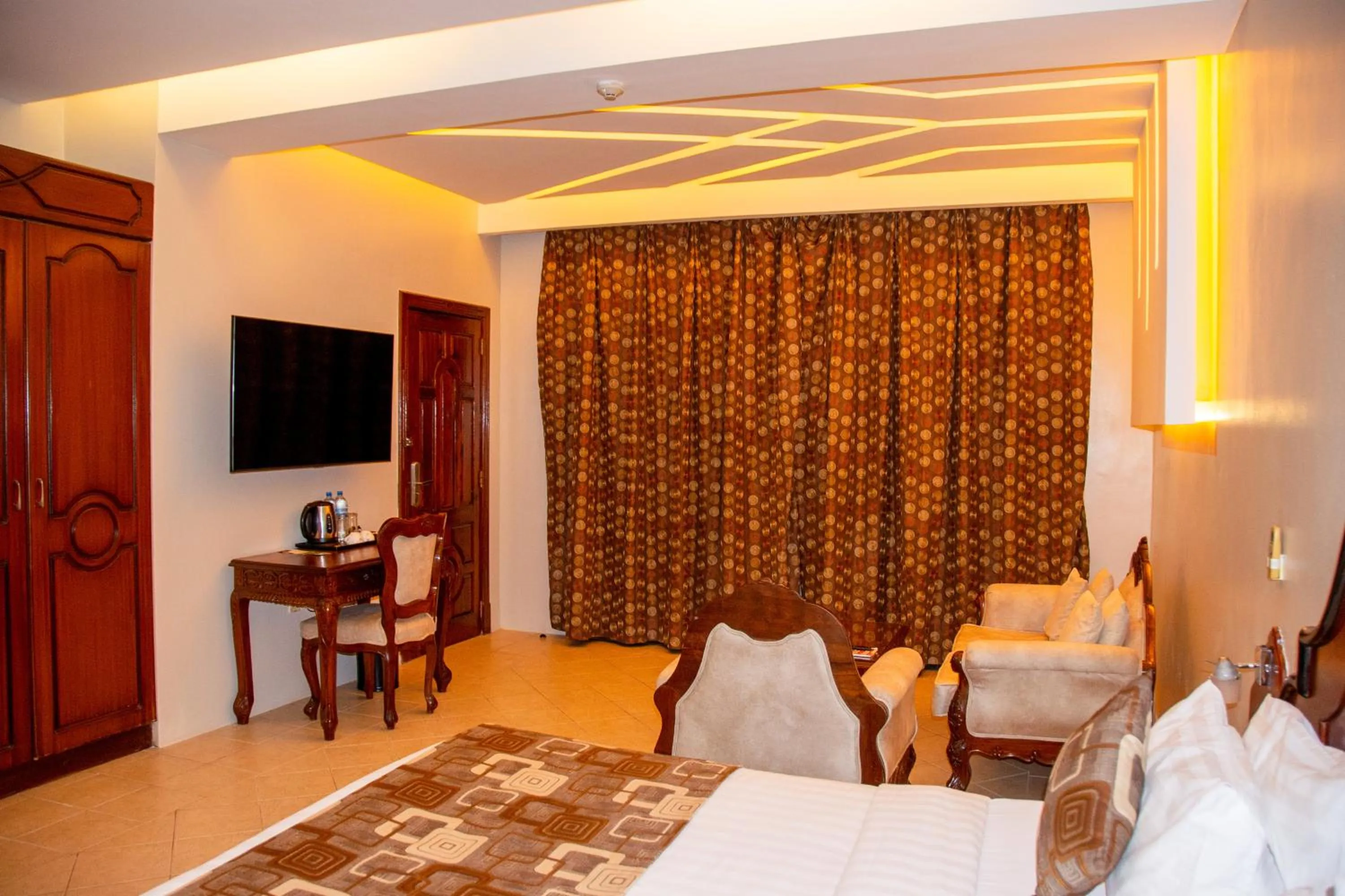 Bed in Malaika Beach Resort