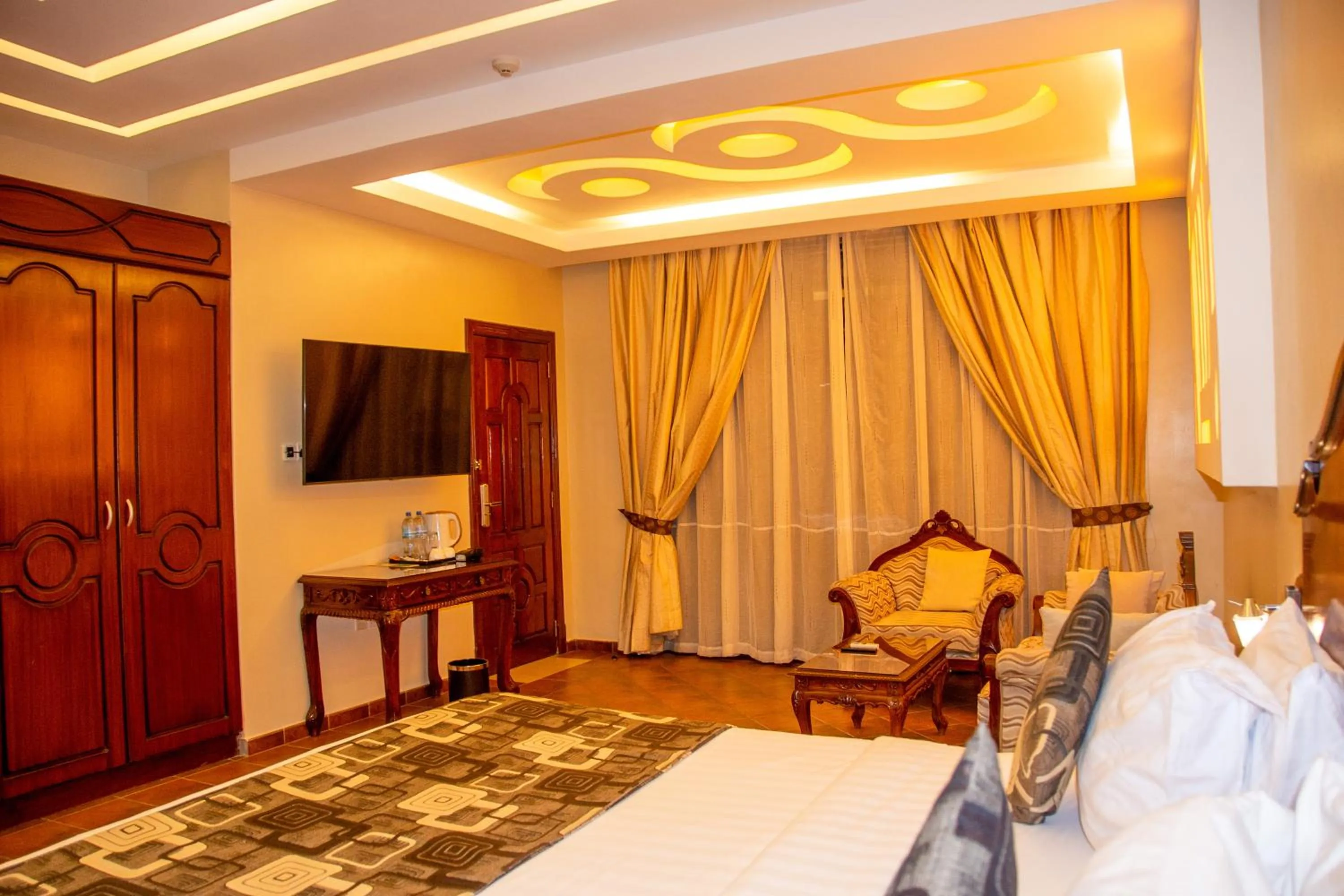 Bed in Malaika Beach Resort