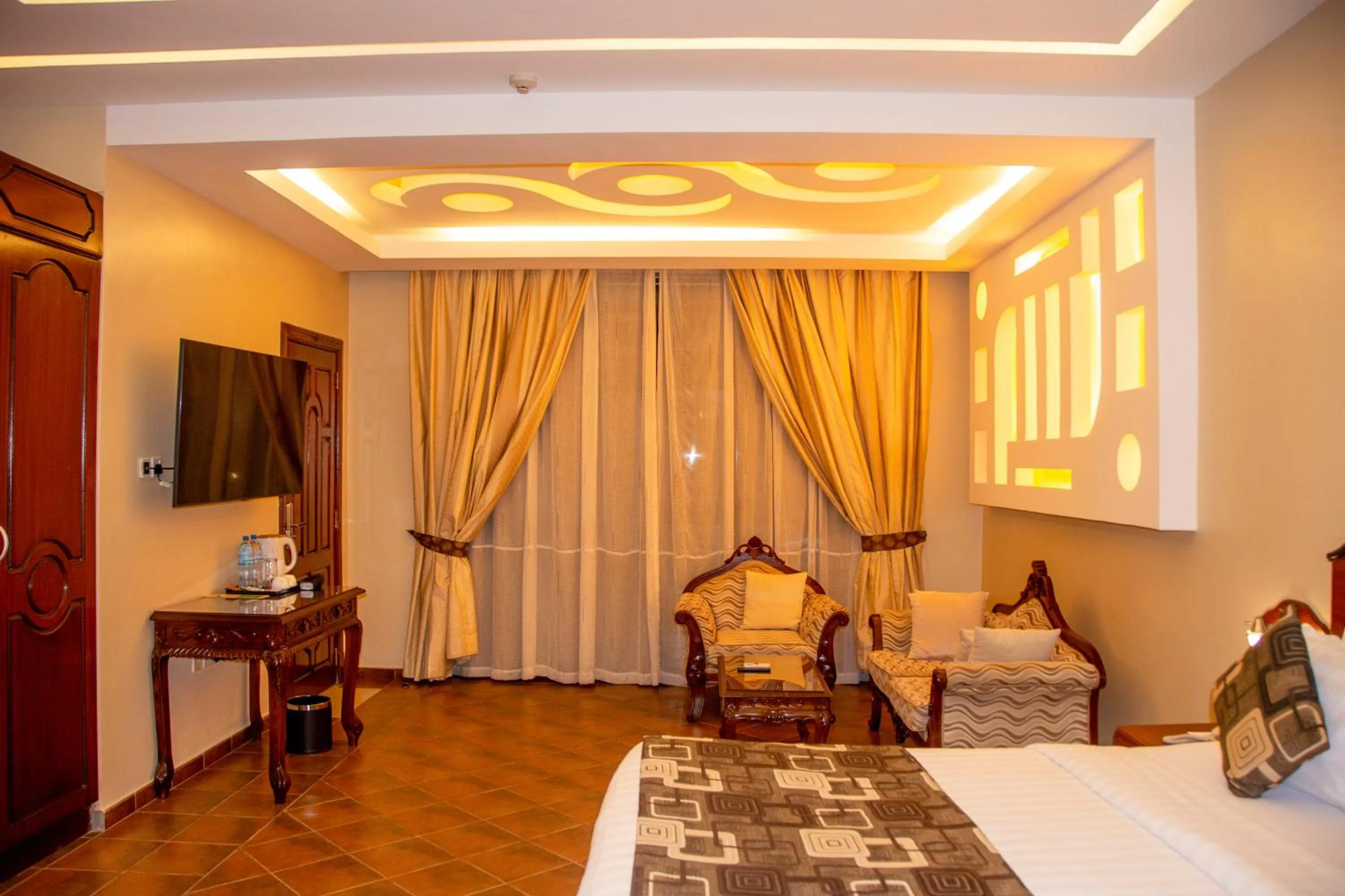 Bed in Malaika Beach Resort