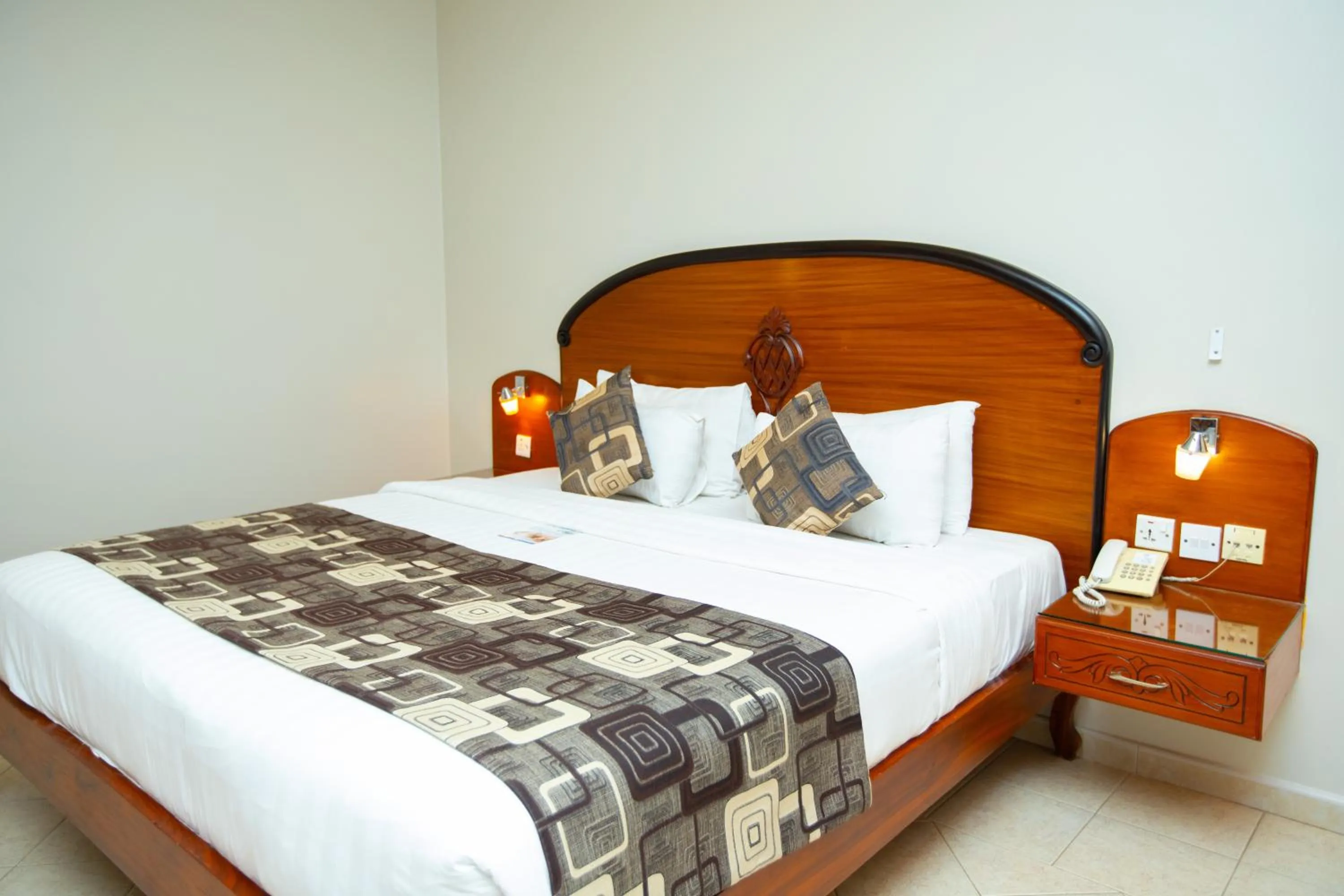 Bed in Malaika Beach Resort