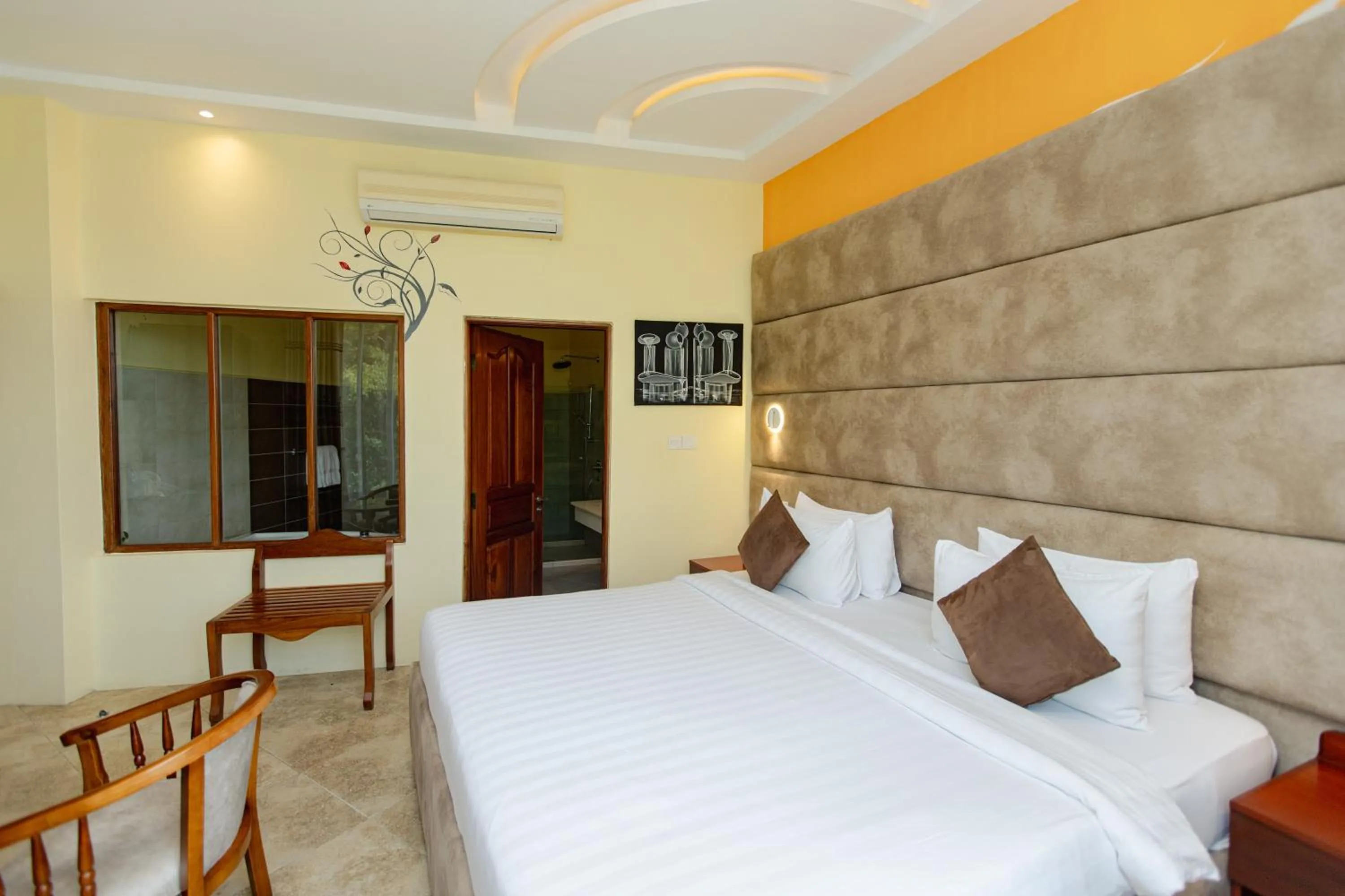 Bed in Malaika Beach Resort