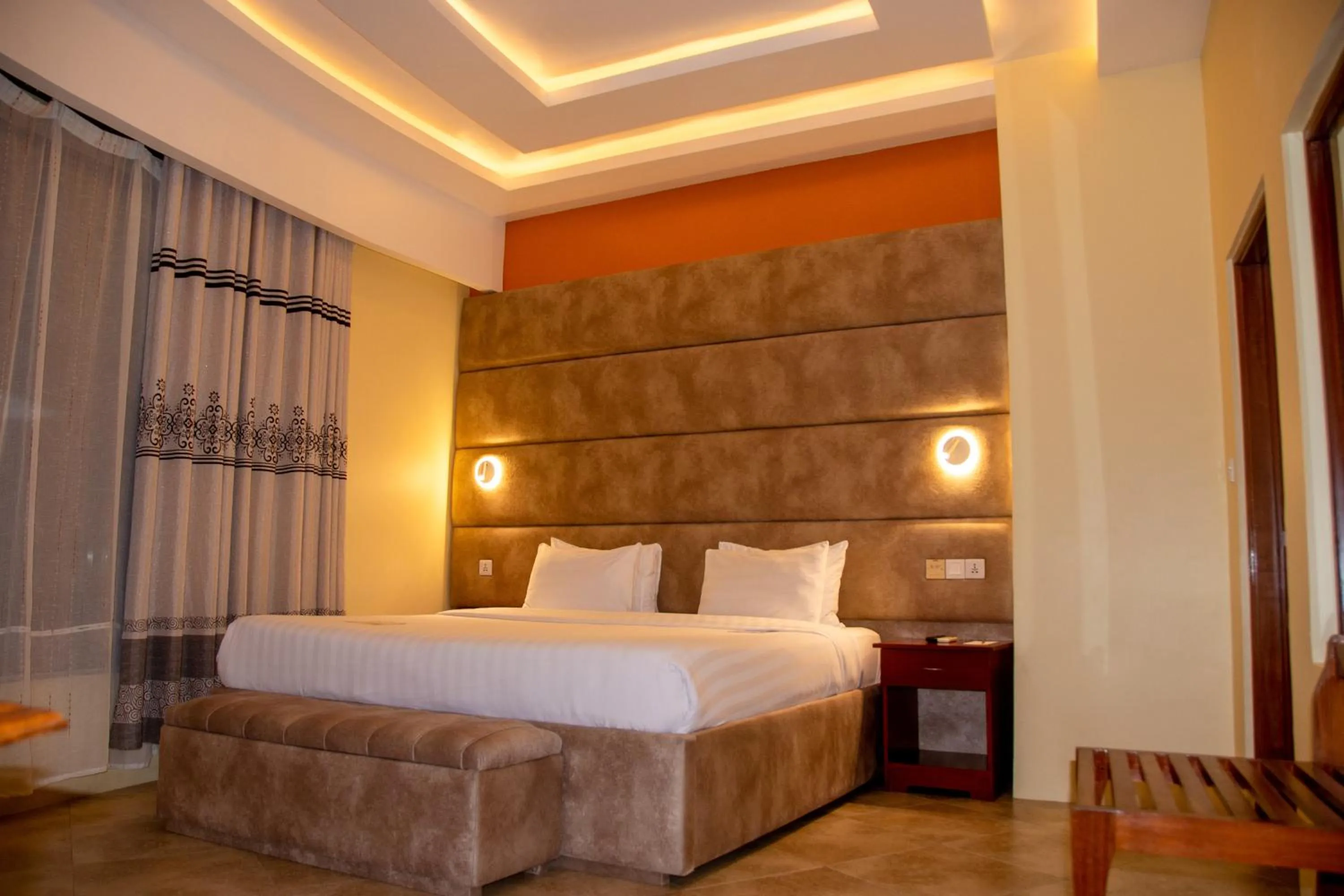 Bed in Malaika Beach Resort