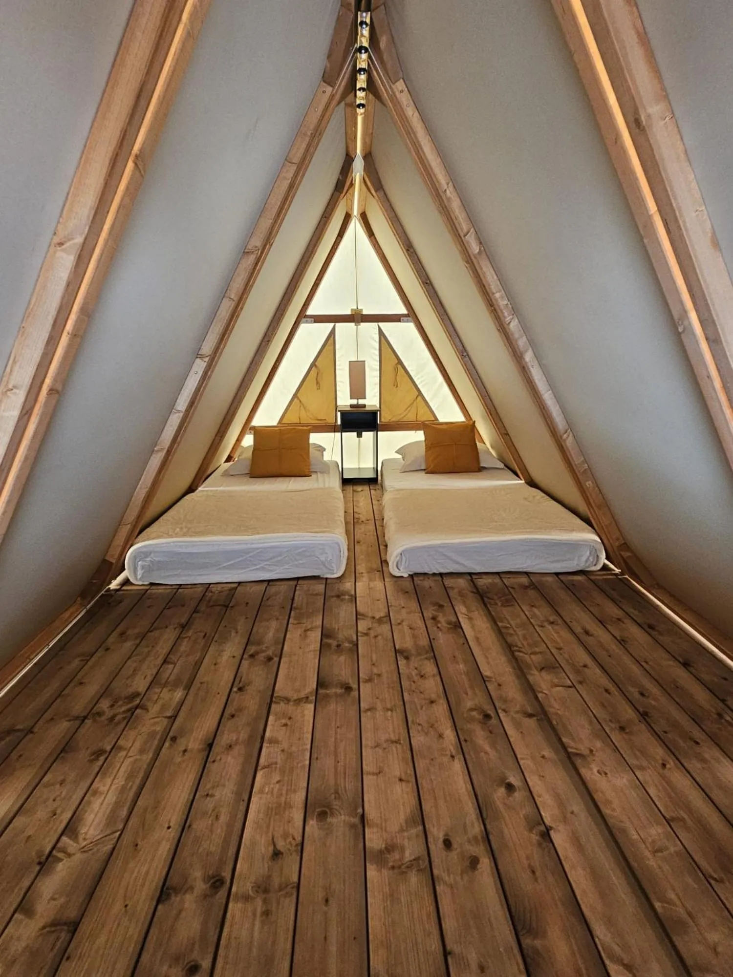 Bed in Aquamare Beach Camp Resort