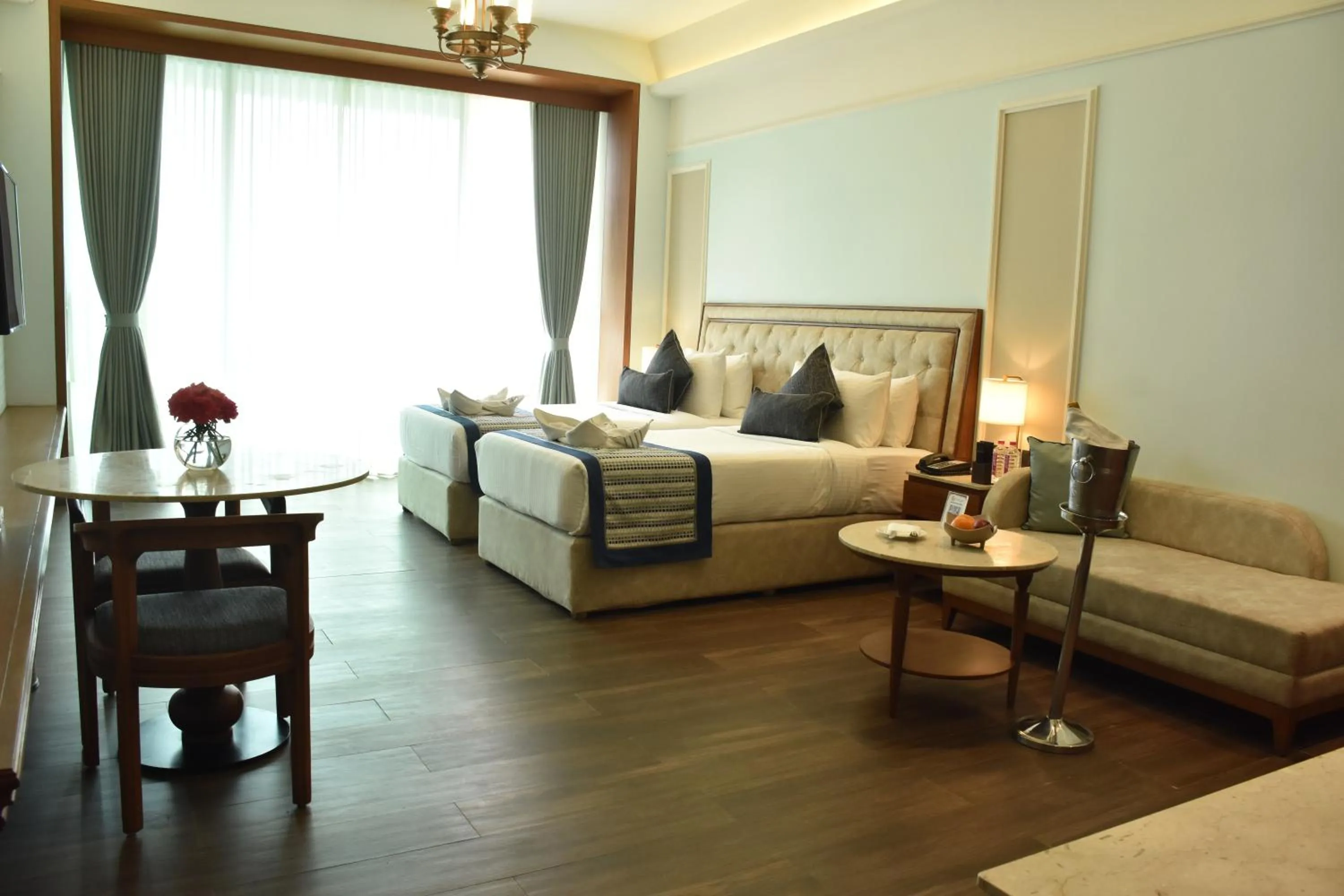 Living room, Bed in Gift City Club, a member of Radisson Individuals