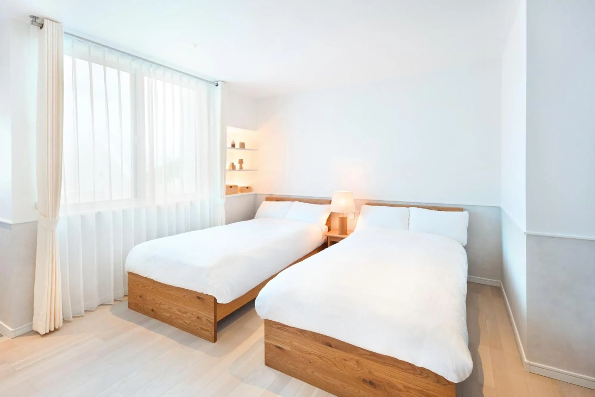 Bed in Pricia Resort Yoron