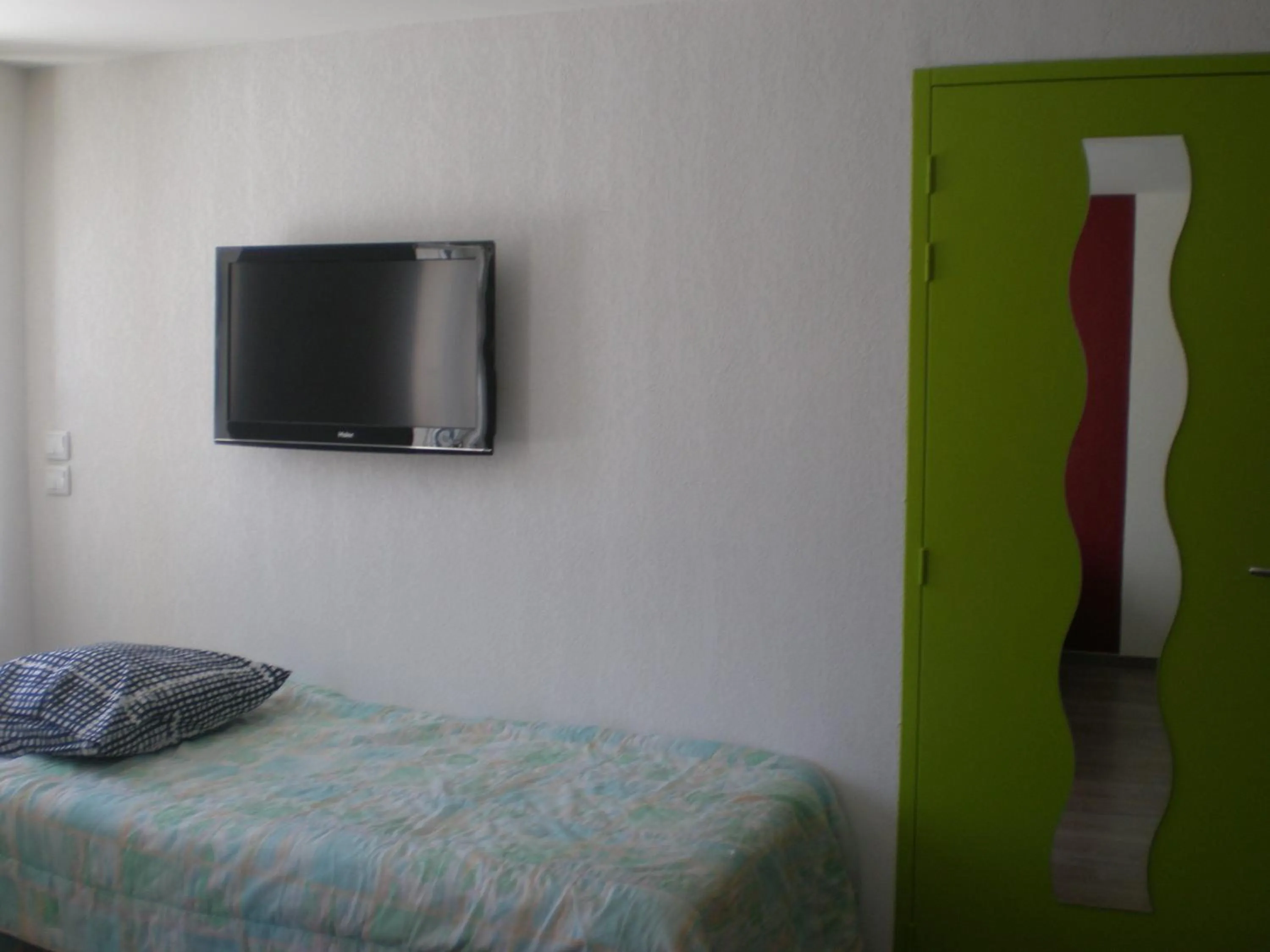 Bed in Appart Hotel de la Paix