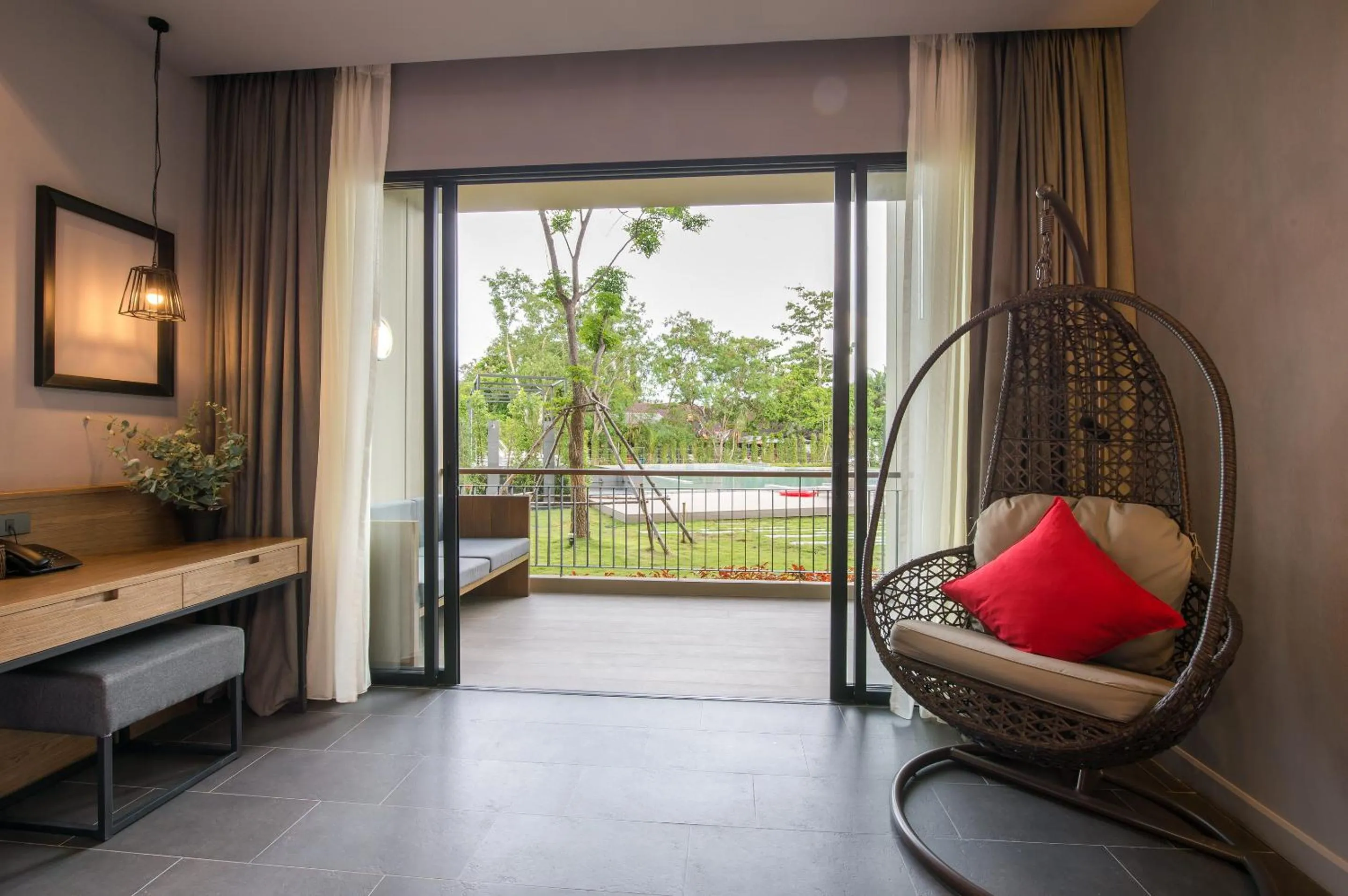 Bed in The Gallery Hotel Nai Harn