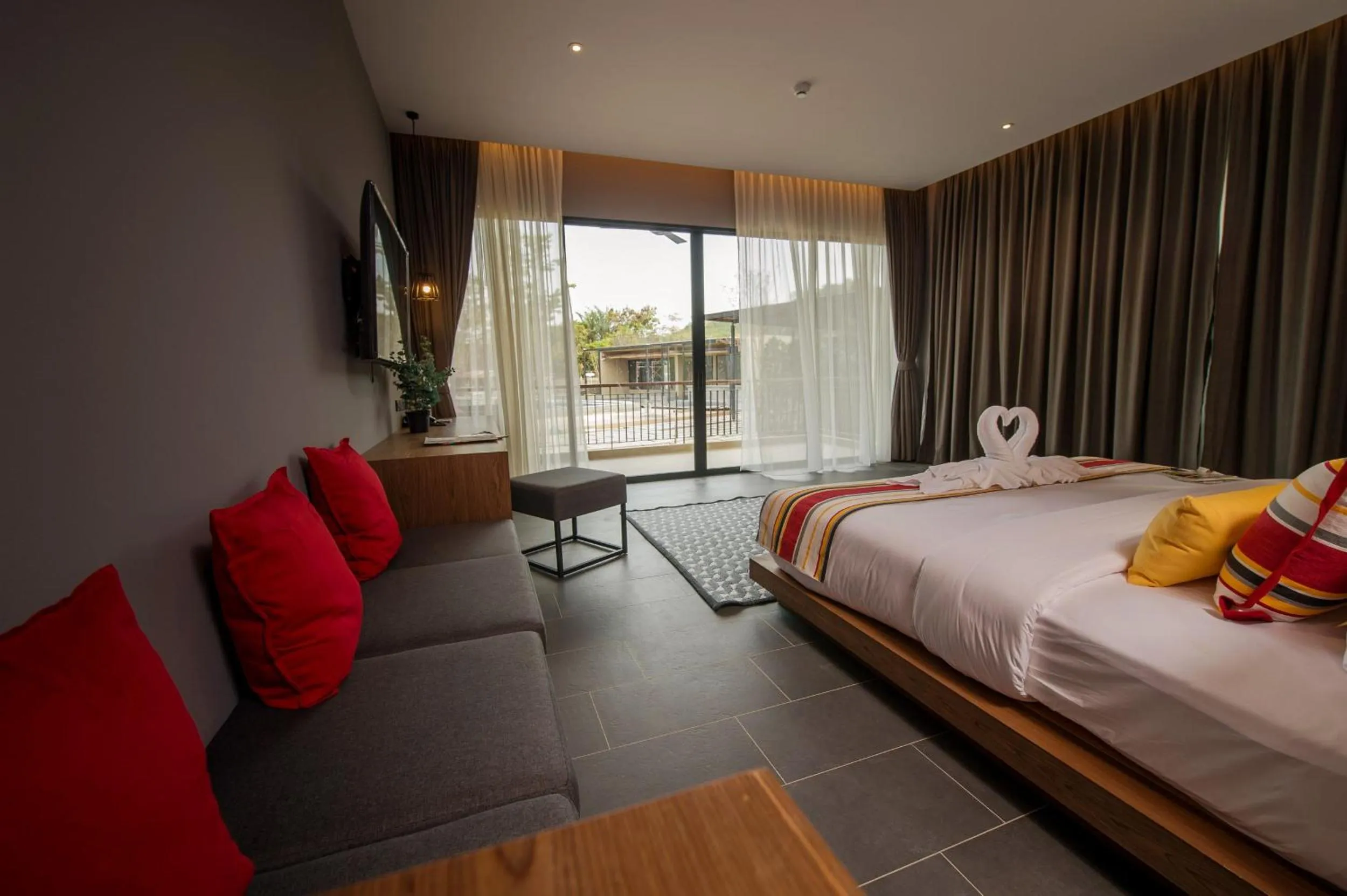 Bed in The Gallery Hotel Nai Harn