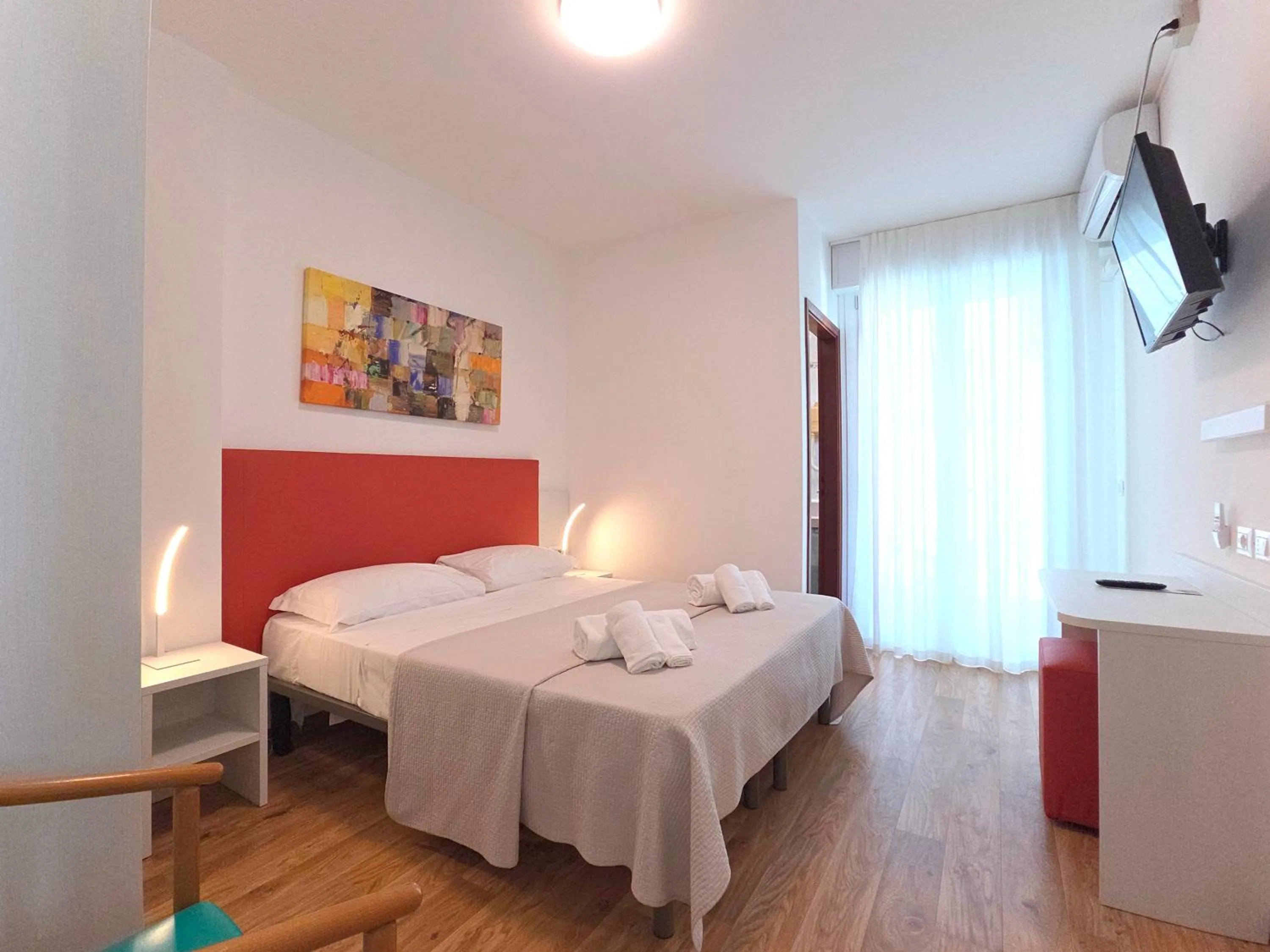 Bed in Hotel Royal Garnì