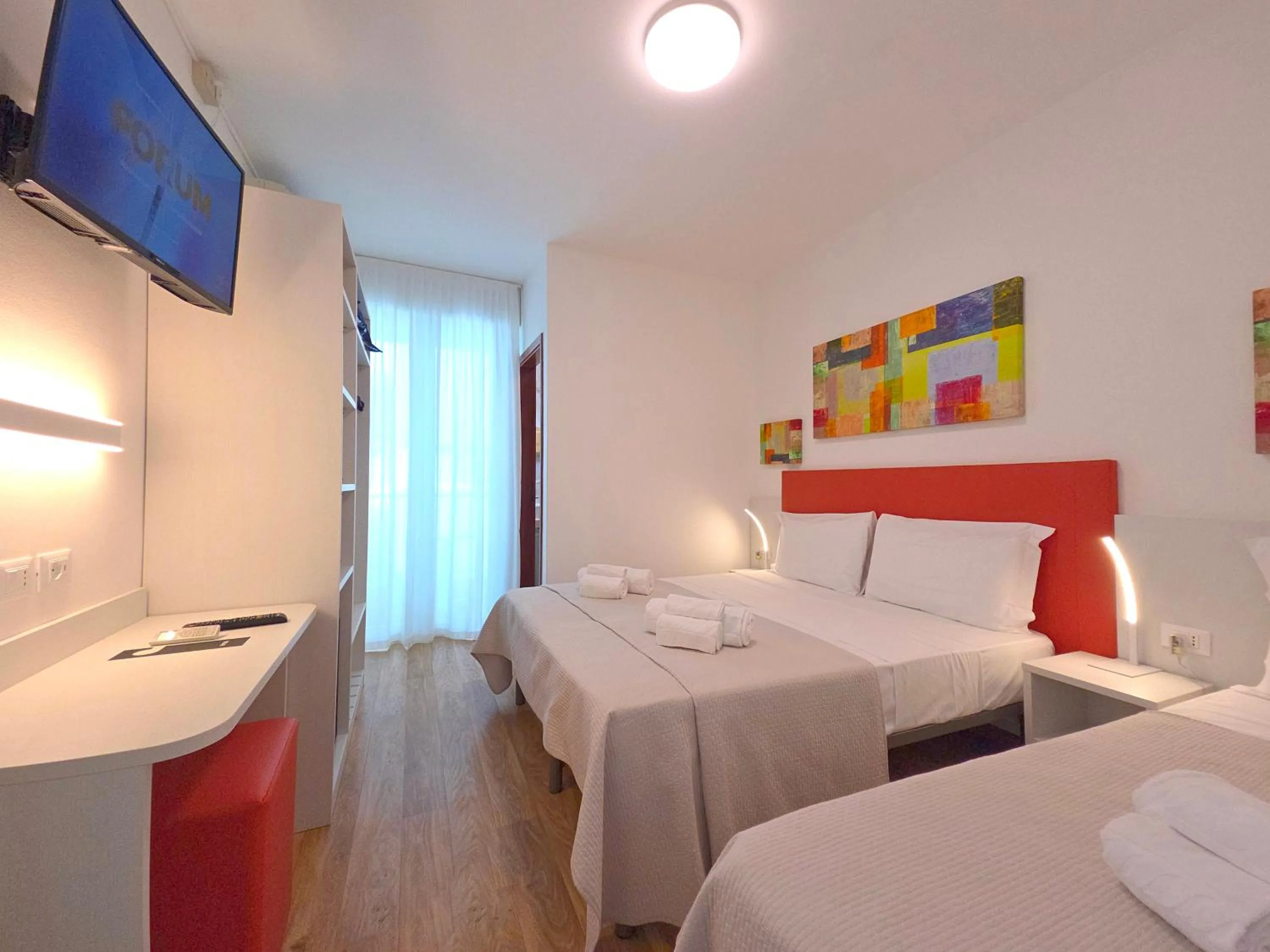 Bed in Hotel Royal Garnì