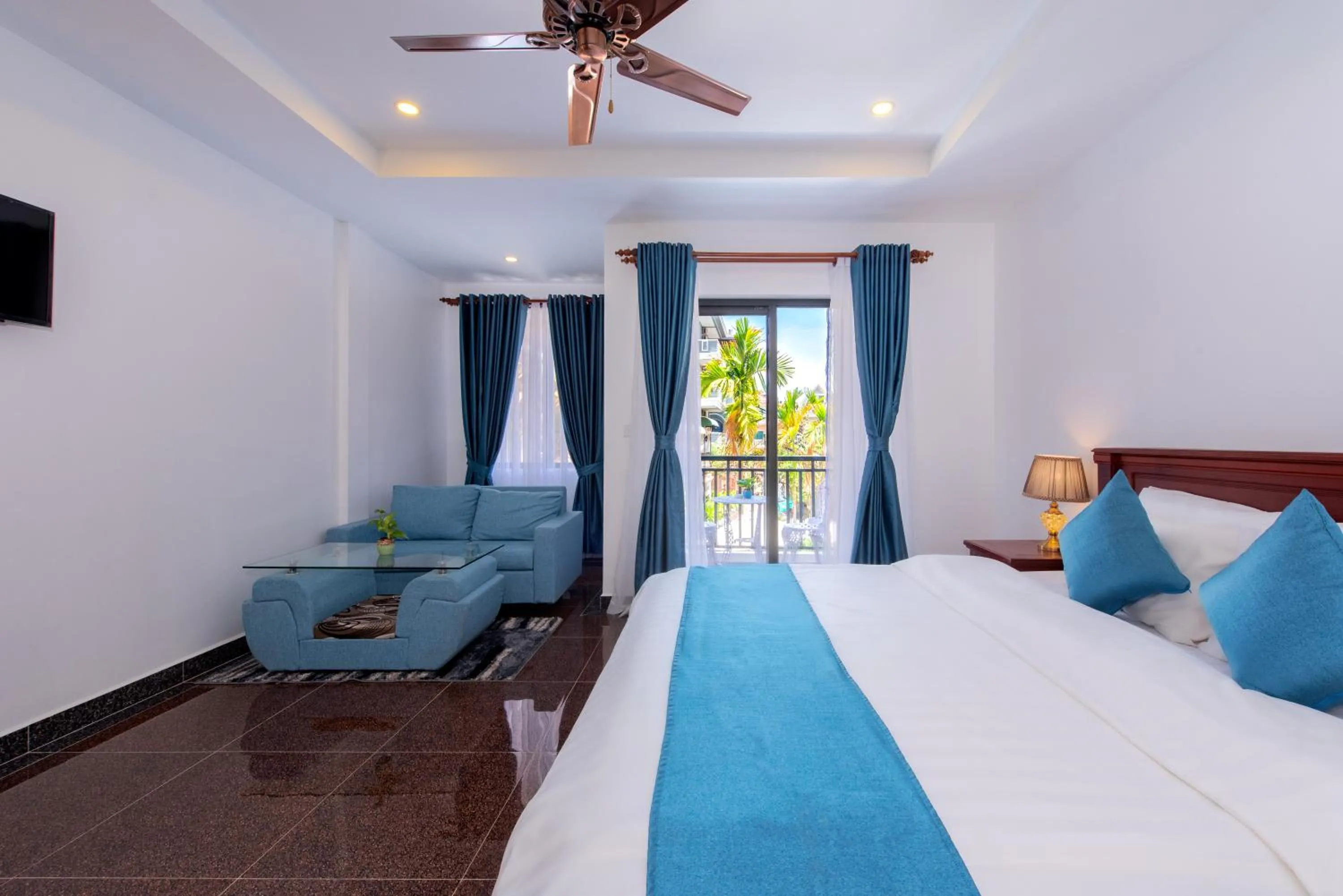 Photo of the whole room, Bed in The Unique Angkor Villa