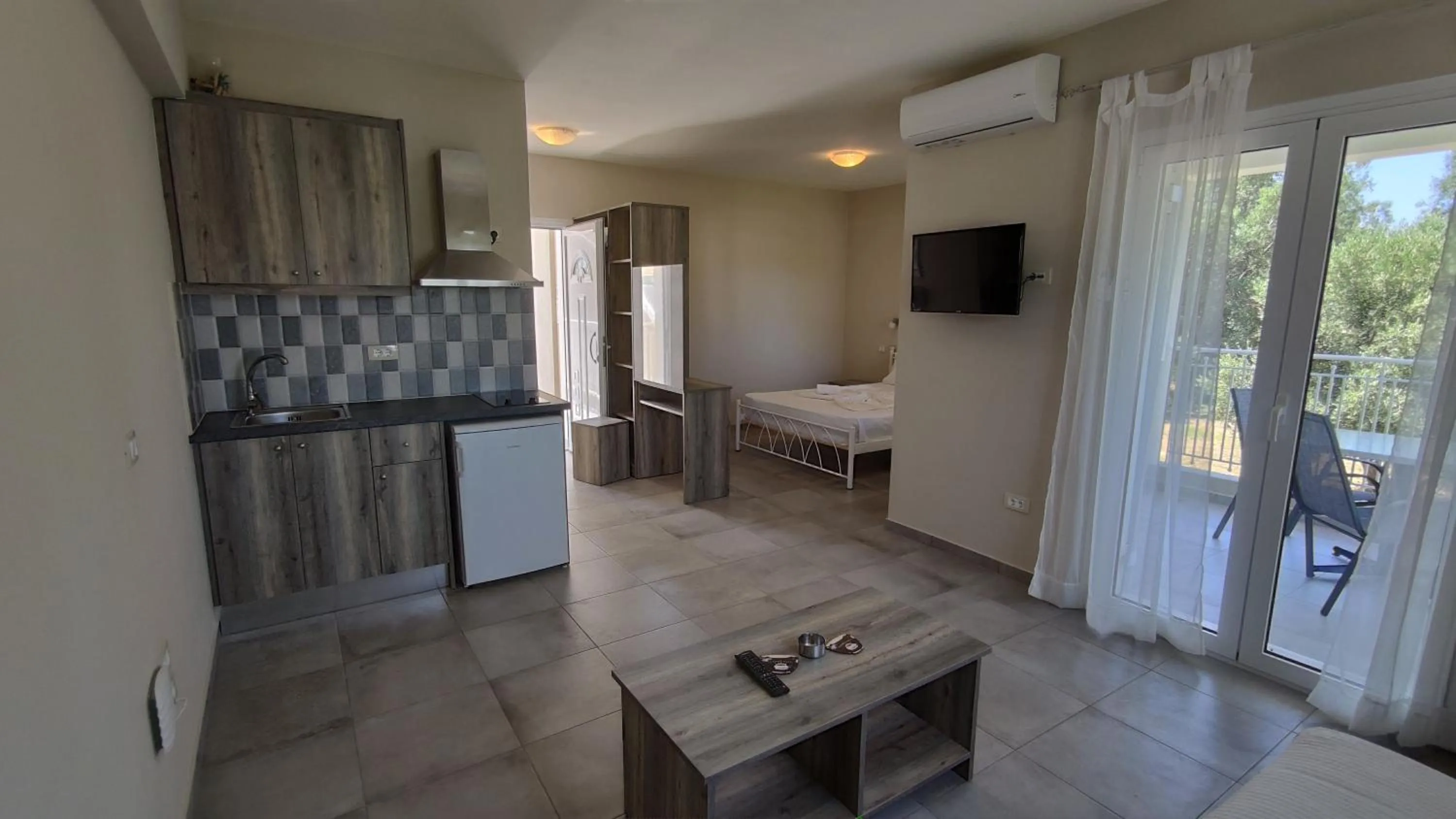 Bed in Casa De Rosa Apartments & Studios