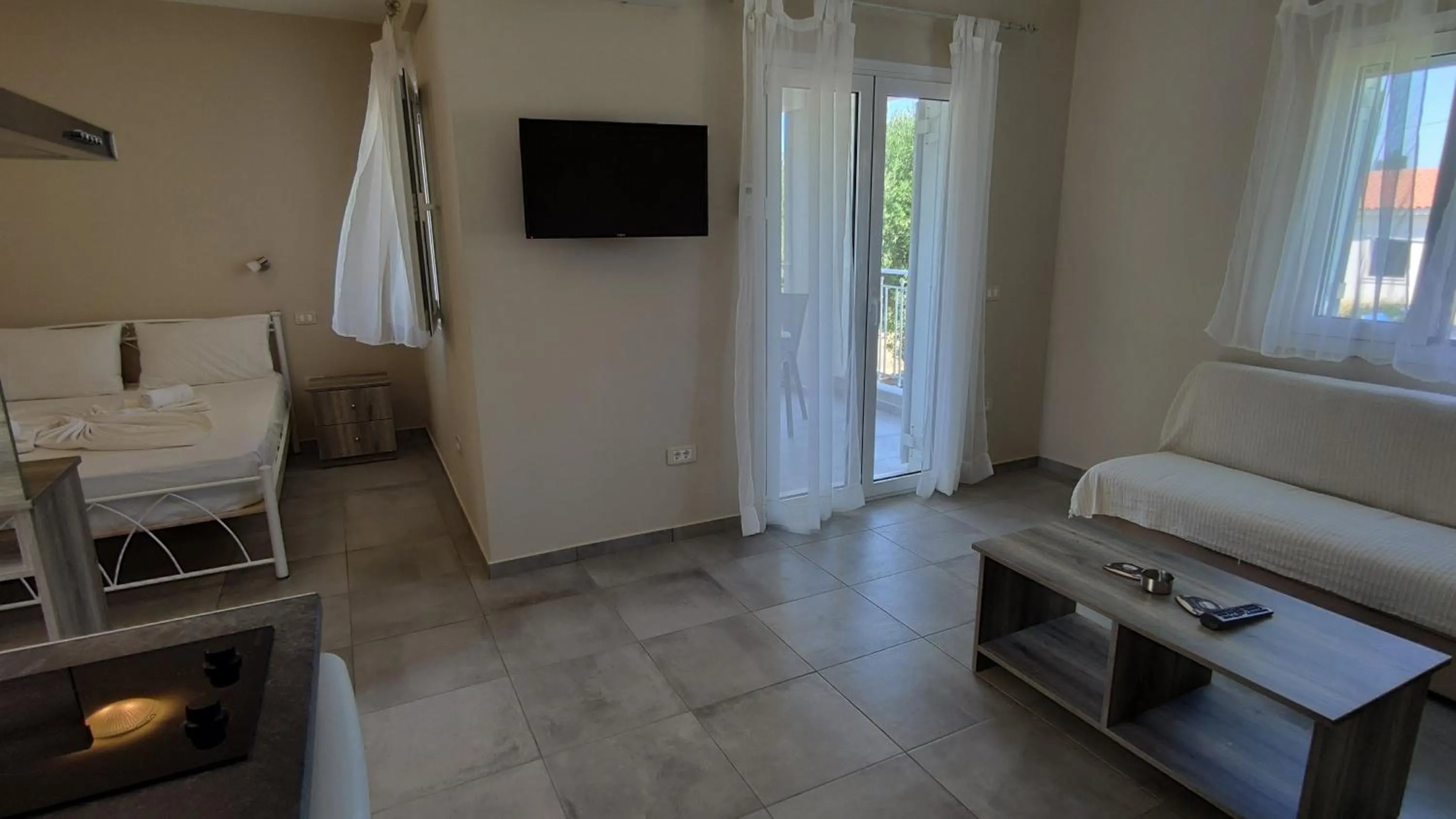 Bed in Casa De Rosa Apartments & Studios