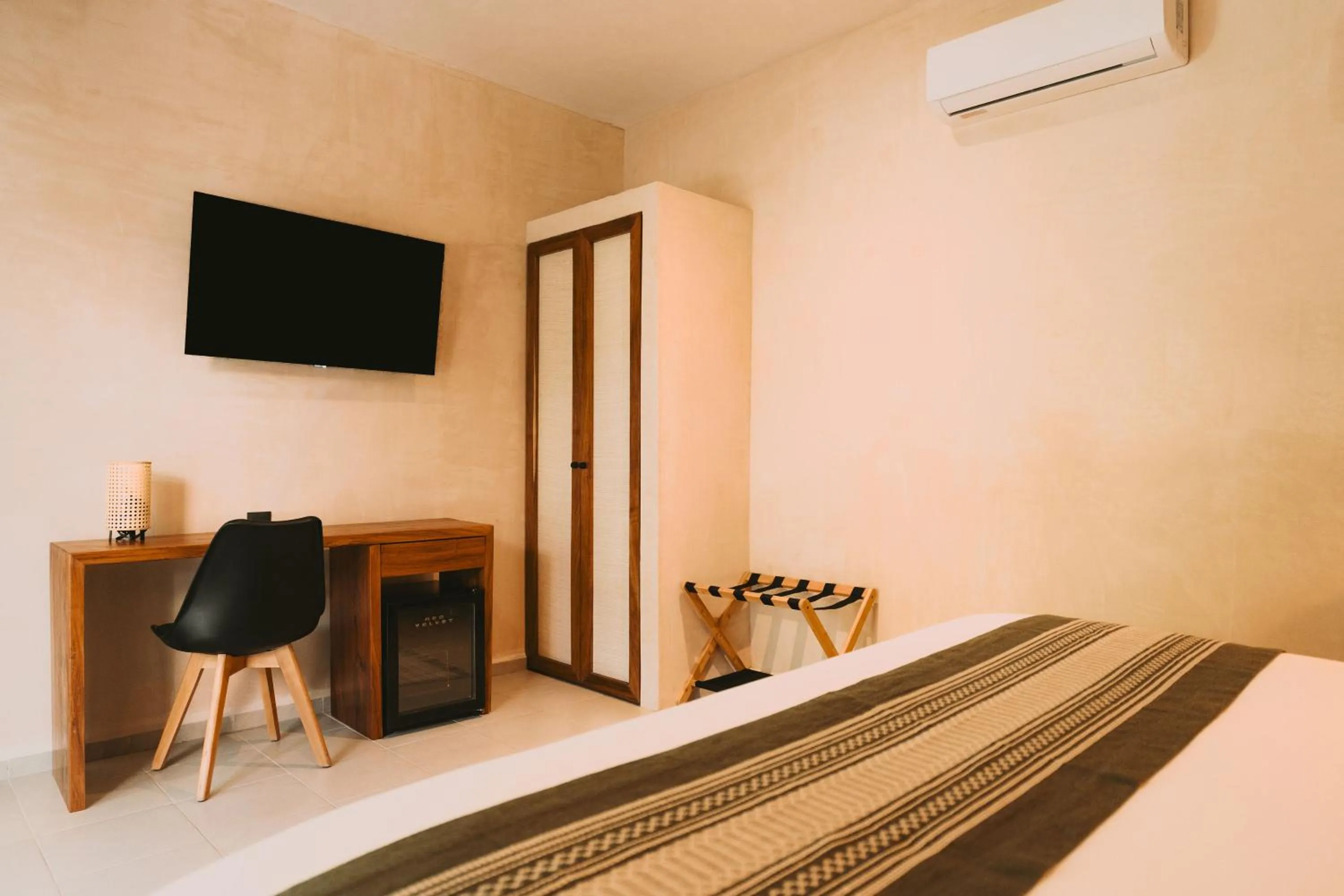 Bedroom, Bed in Zelune Luxury Lagoon Resort Bacalar - Adults Only