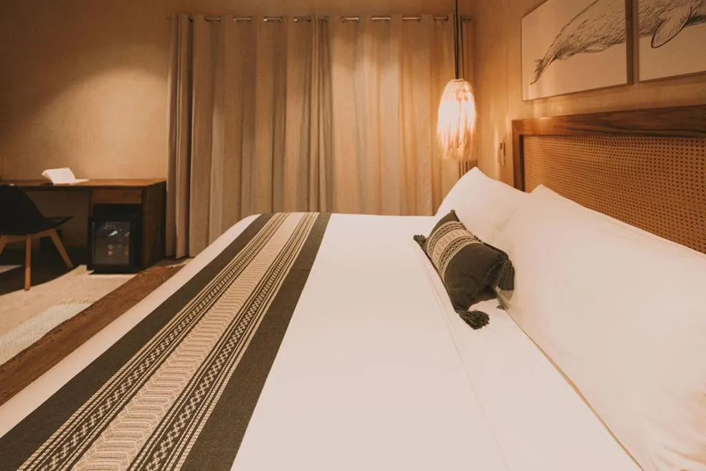 Bed in Zelune Luxury Lagoon Resort Bacalar - Adults Only