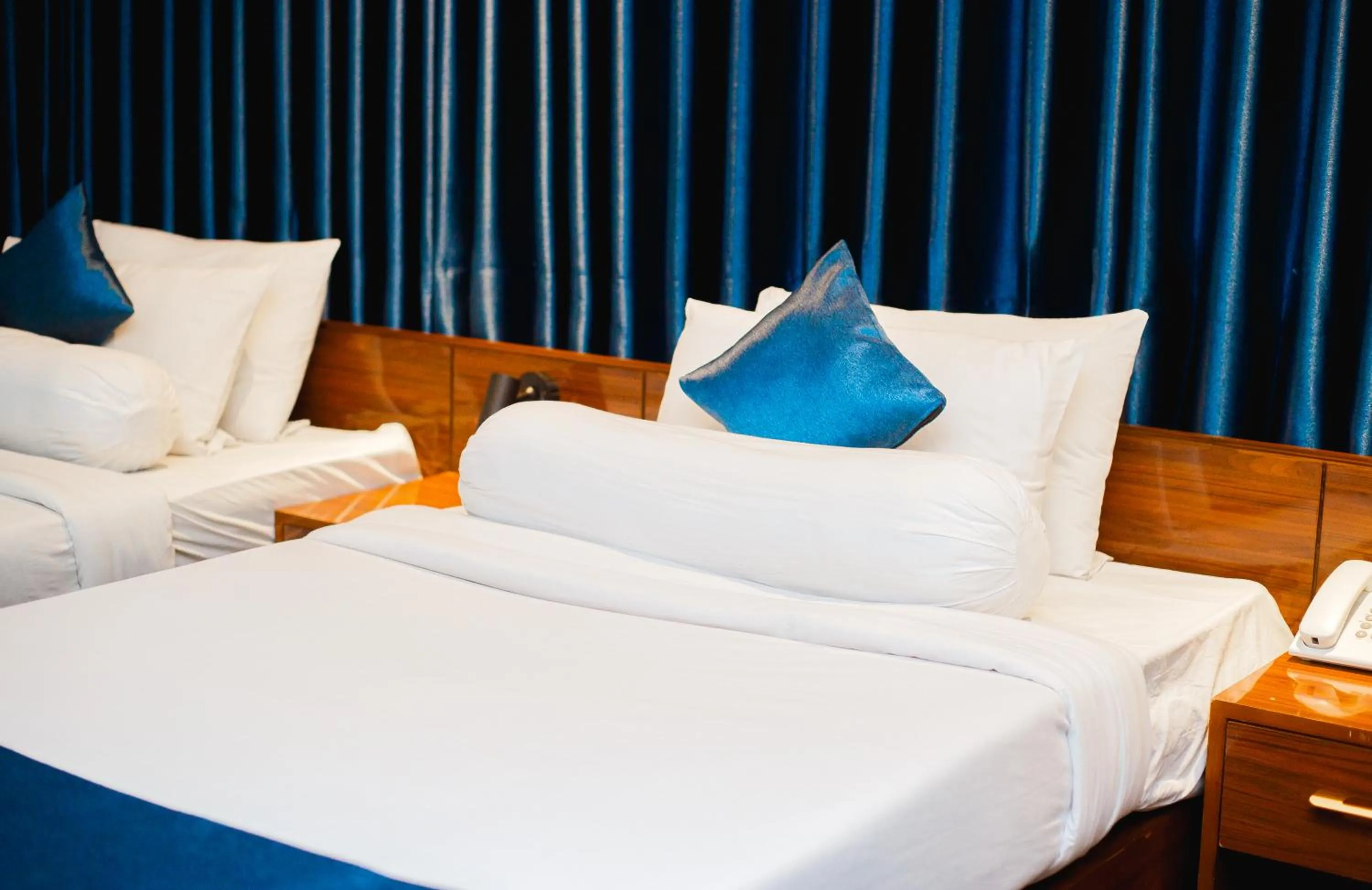 Bed in HOTEL THE CAPITAL LTD.