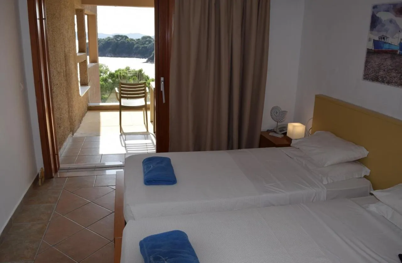 Bed in Cape Kanapitsa Hotel & Suites