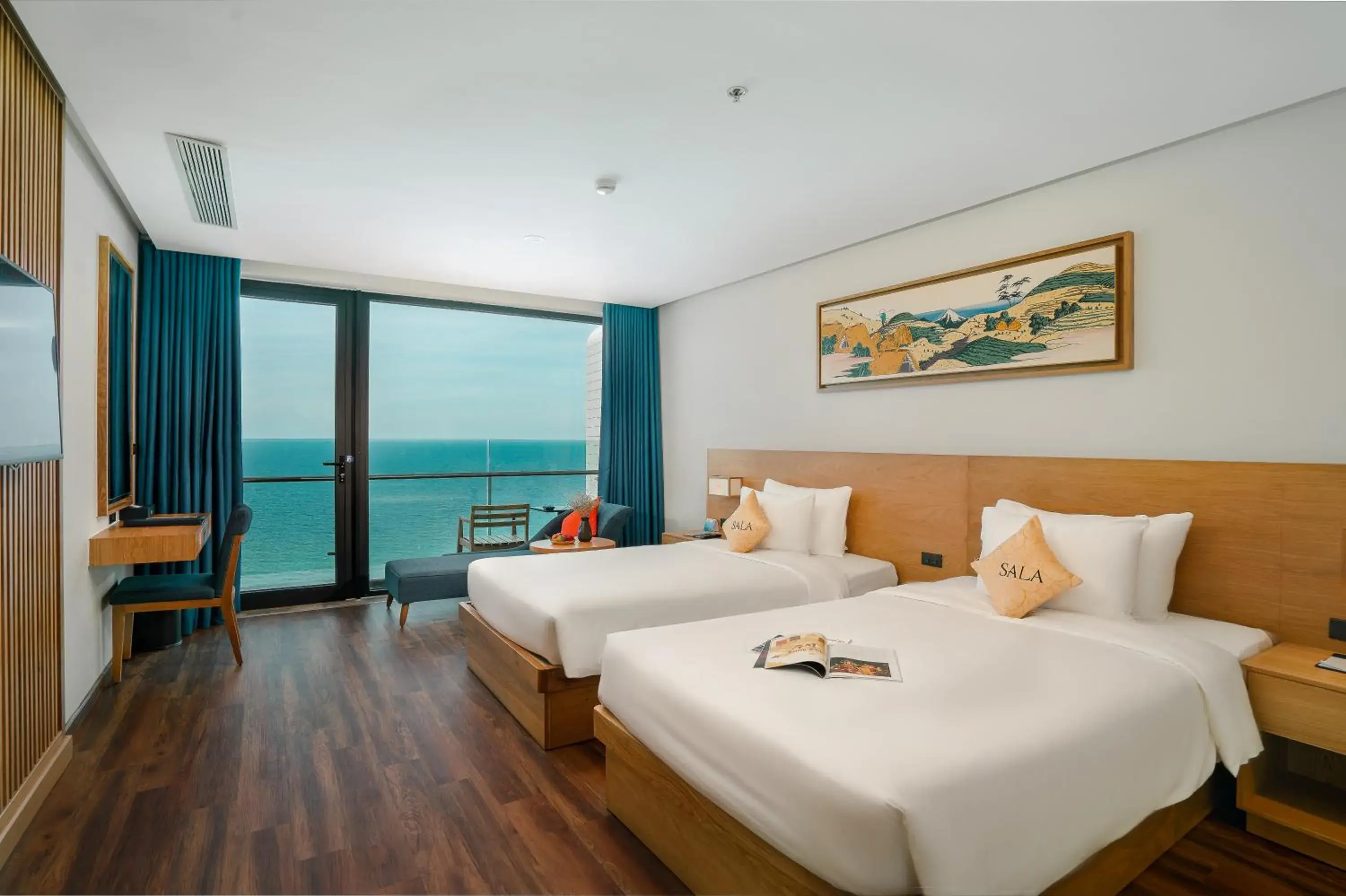Deluxe Twin Room with Balcony and Sea View in Sala Danang Beach Hotel Deluxe Twin Room with Balcony and Sea View in Sala Danang Beach Hotel
